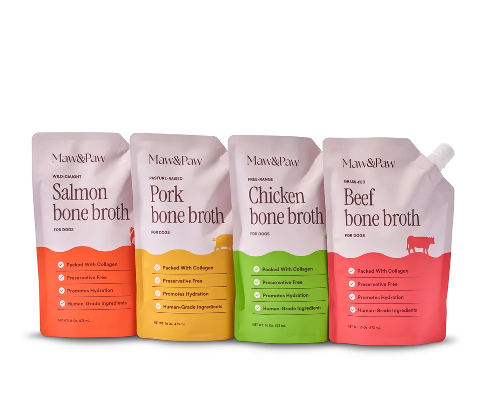 Four bone broth pouches lined up on white