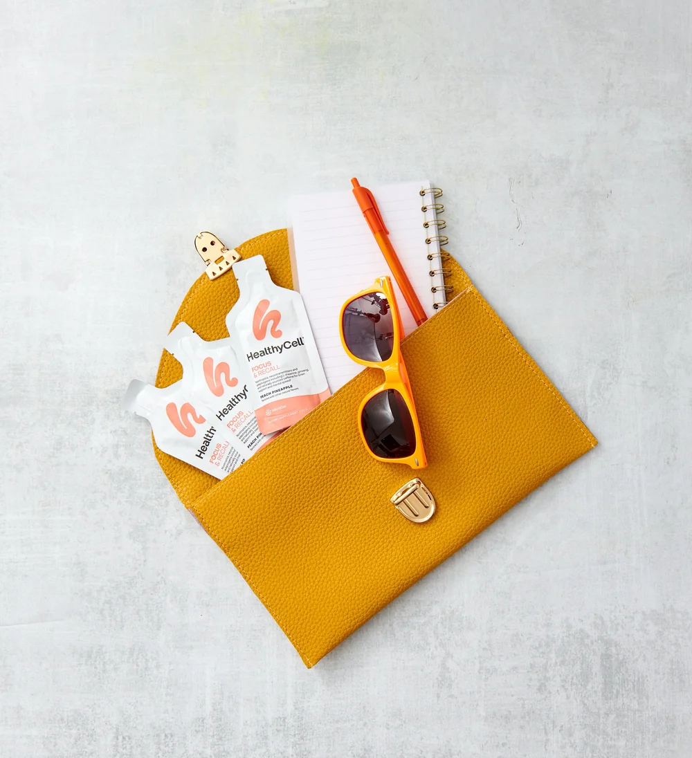Healthy Cell packet in an envelope on yellow, supplement photography