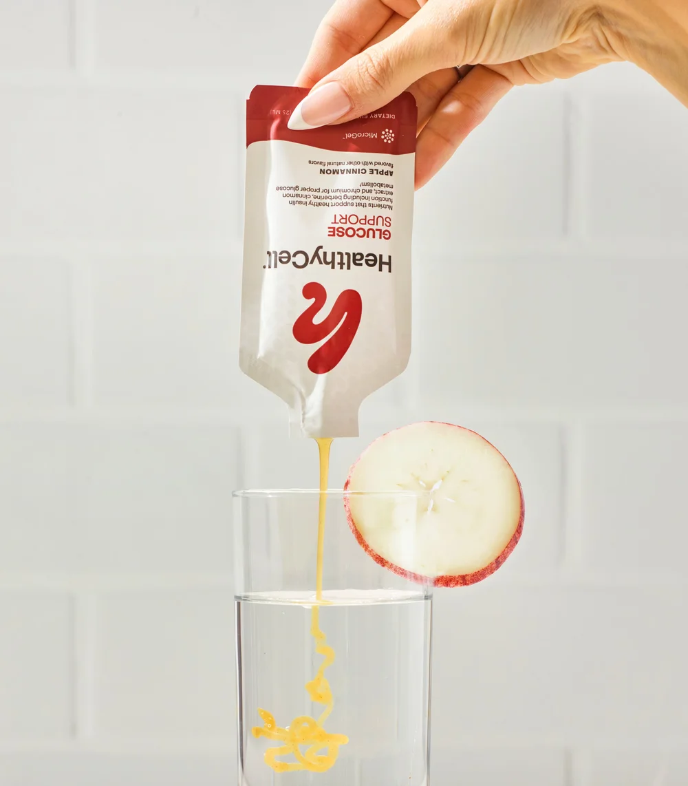 Glucose gel squeezed into a glass of water, supplement photography