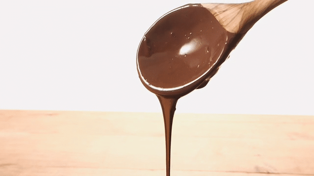 stop motion gif with tiktok transition stirring chocolate and then drizzling chocolate