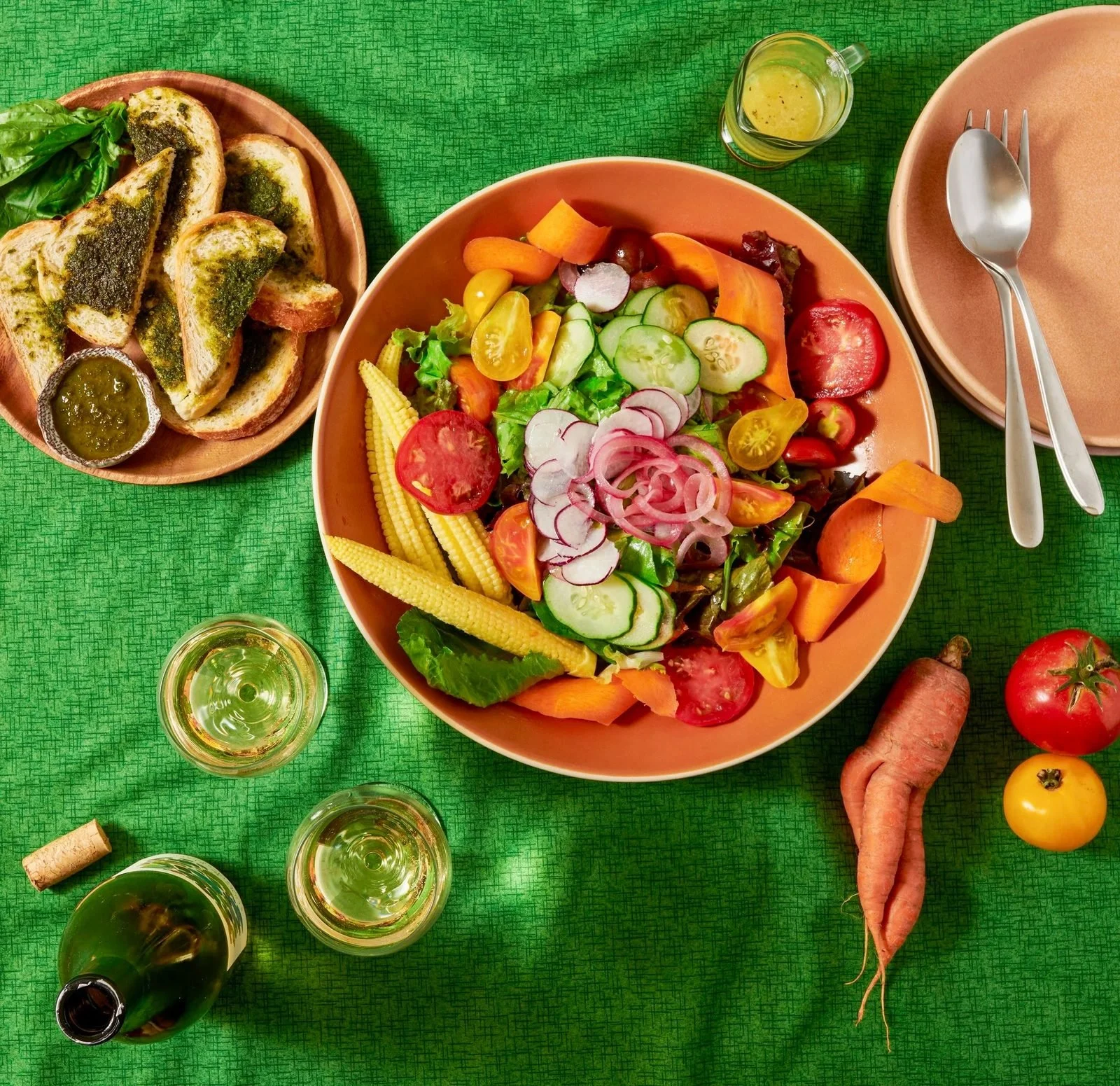 Food styling: farmers market salad on a green table