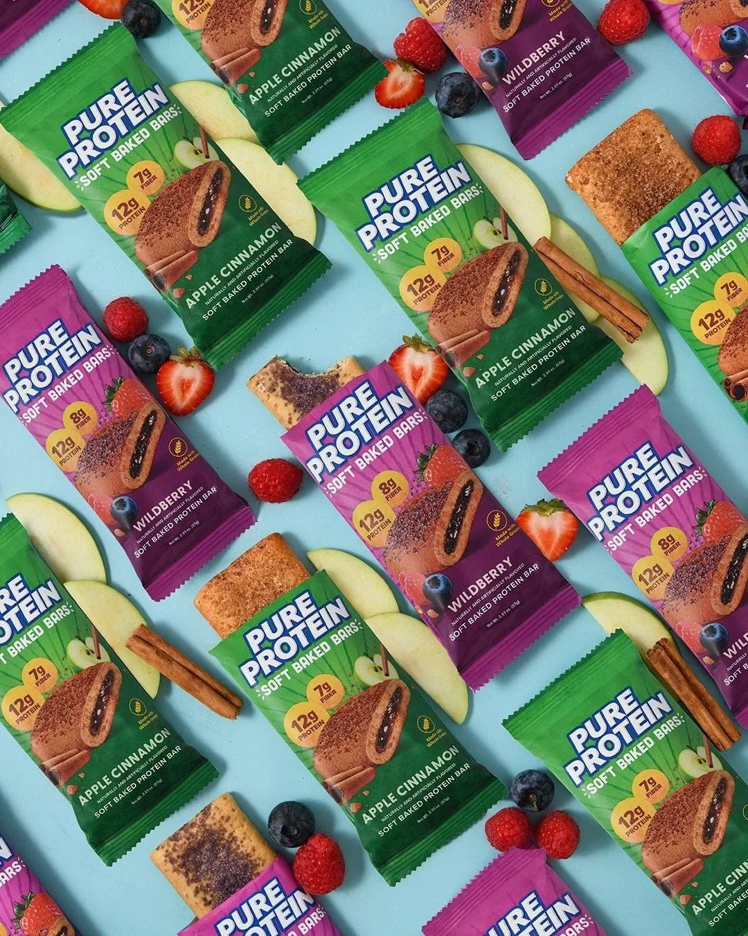 Pure Protein bars in a pattern with apples on teal, CPG snack packaging photography