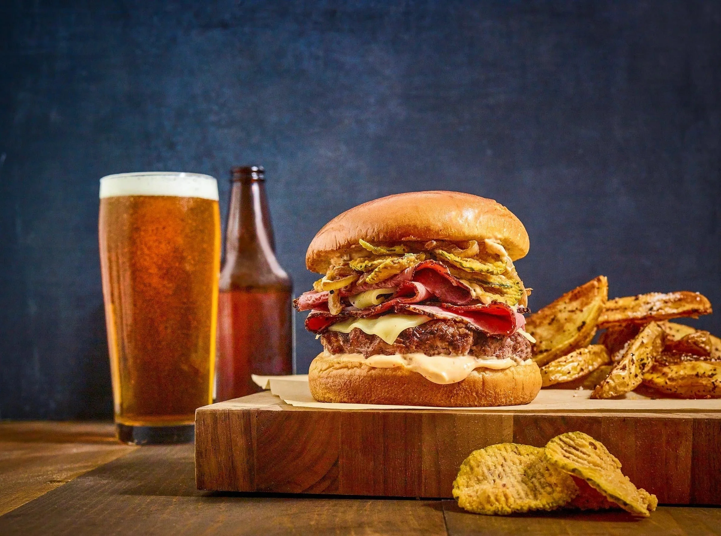 Food styling: pastrami burger with steak fries