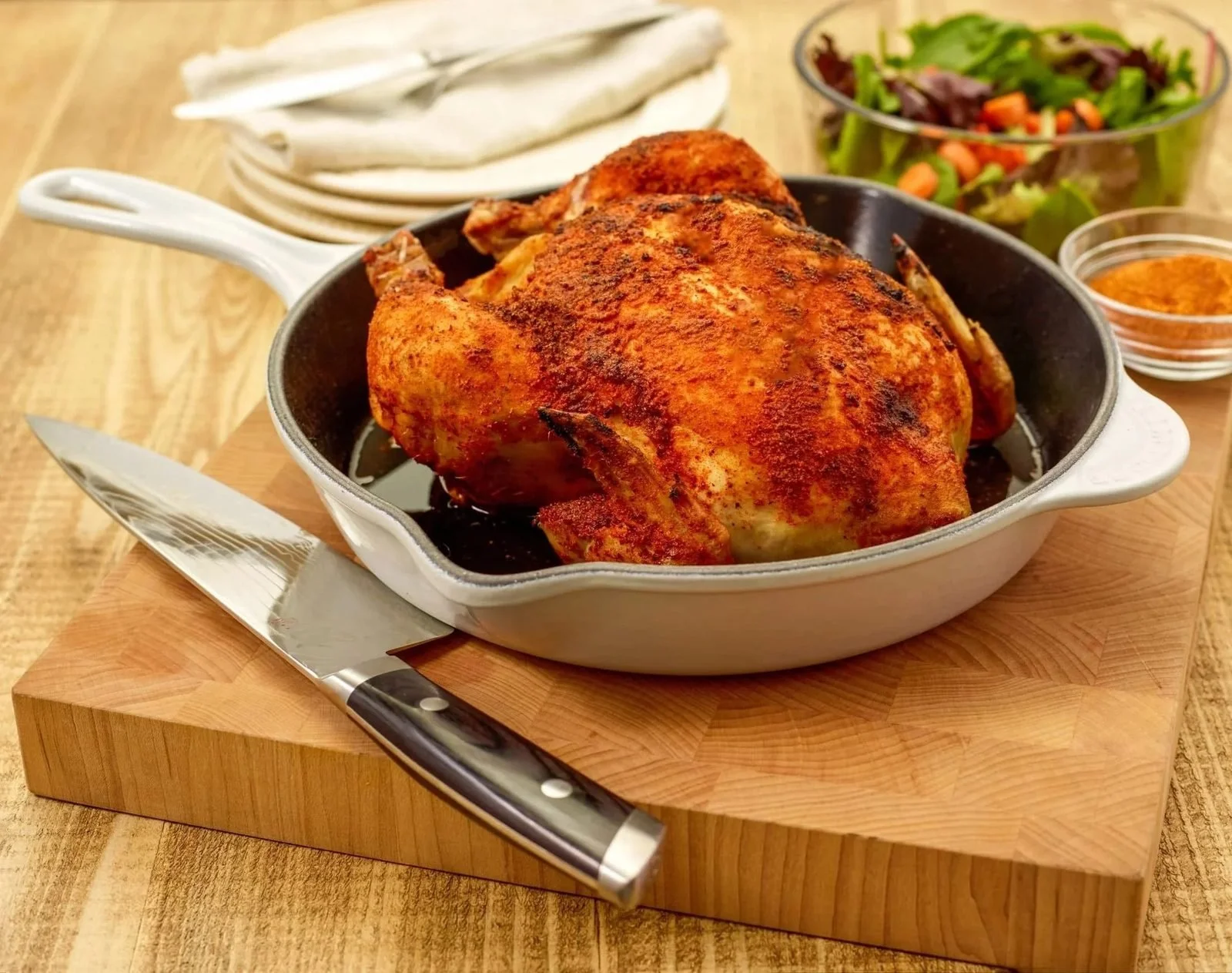 Food styling: whole roast chicken in a skillet
