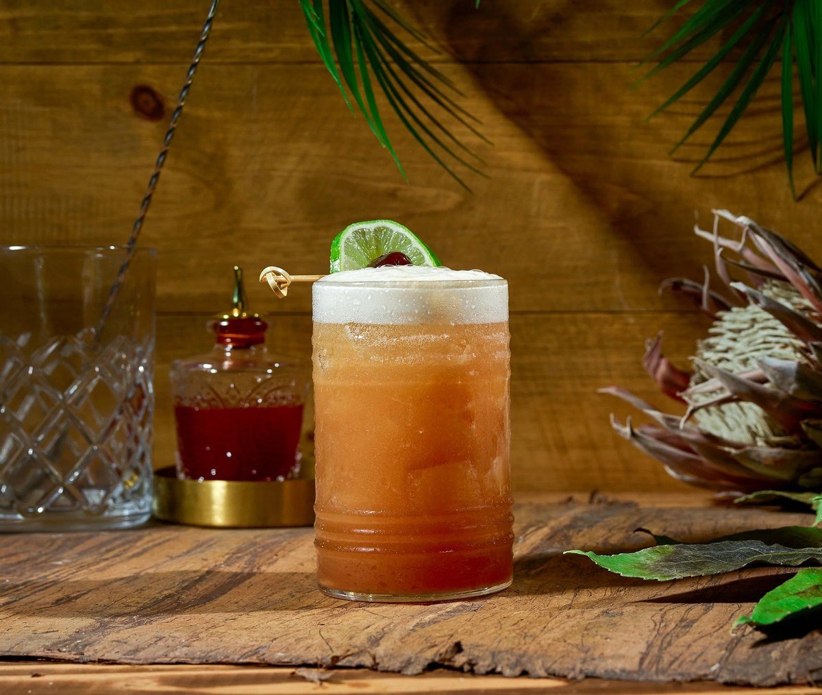 Tiki-style cocktail with a tropical garnish