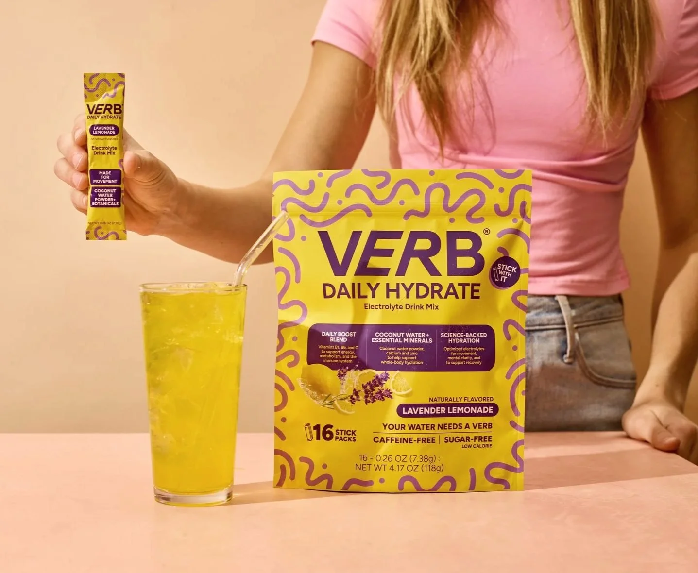 Verb Daily Hydrate drink mix stick and box with a yellow drink, CPG lifestyle photography