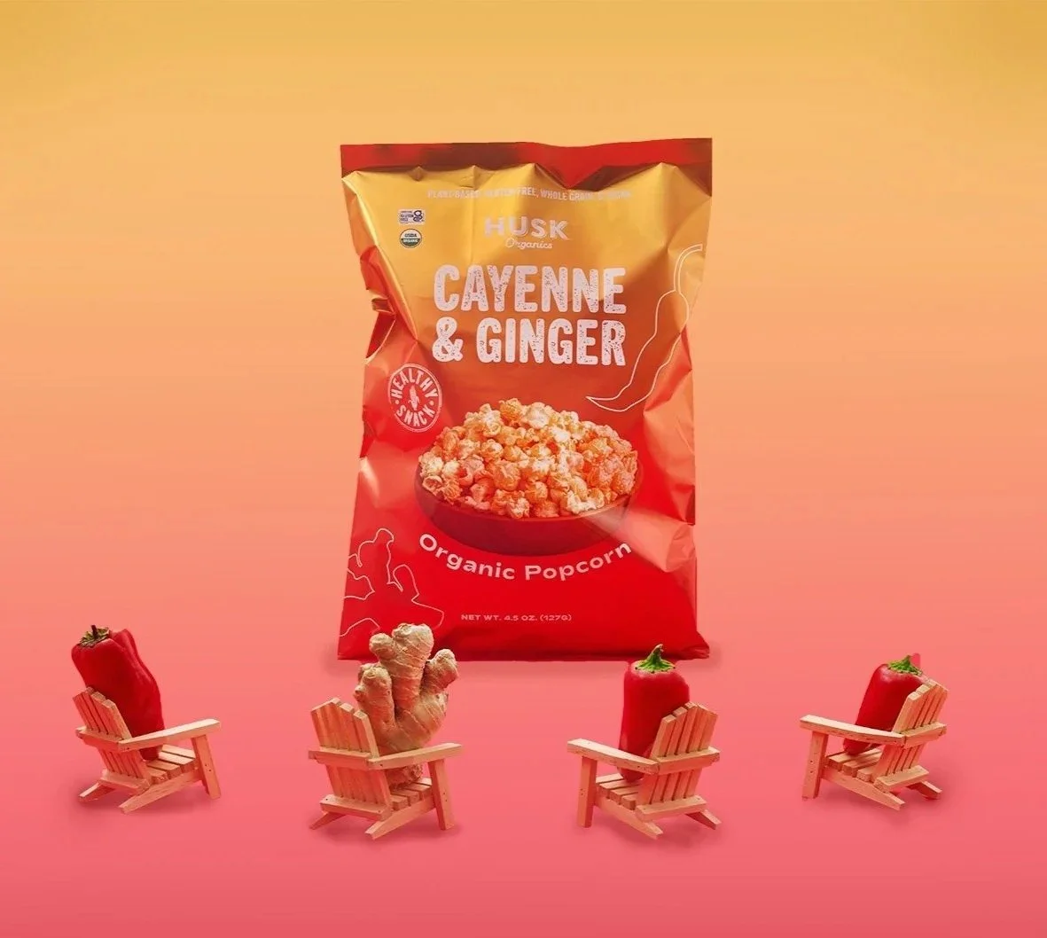 Cayenne and ginger snack bag with tiny Adirondack chairs and strawberries, CPG photography