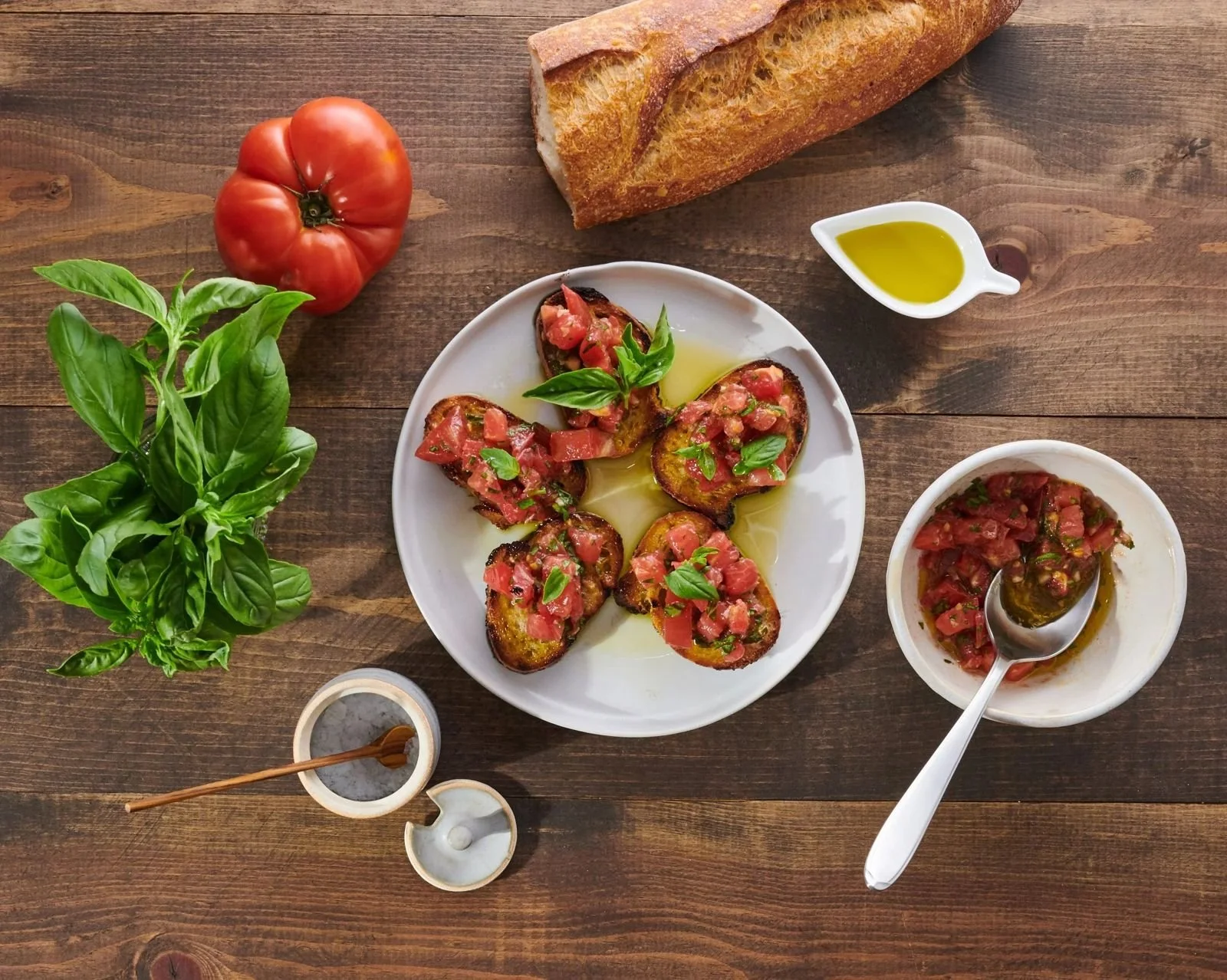 Tomato bruschetta with olive oil and basil, editorial food photography