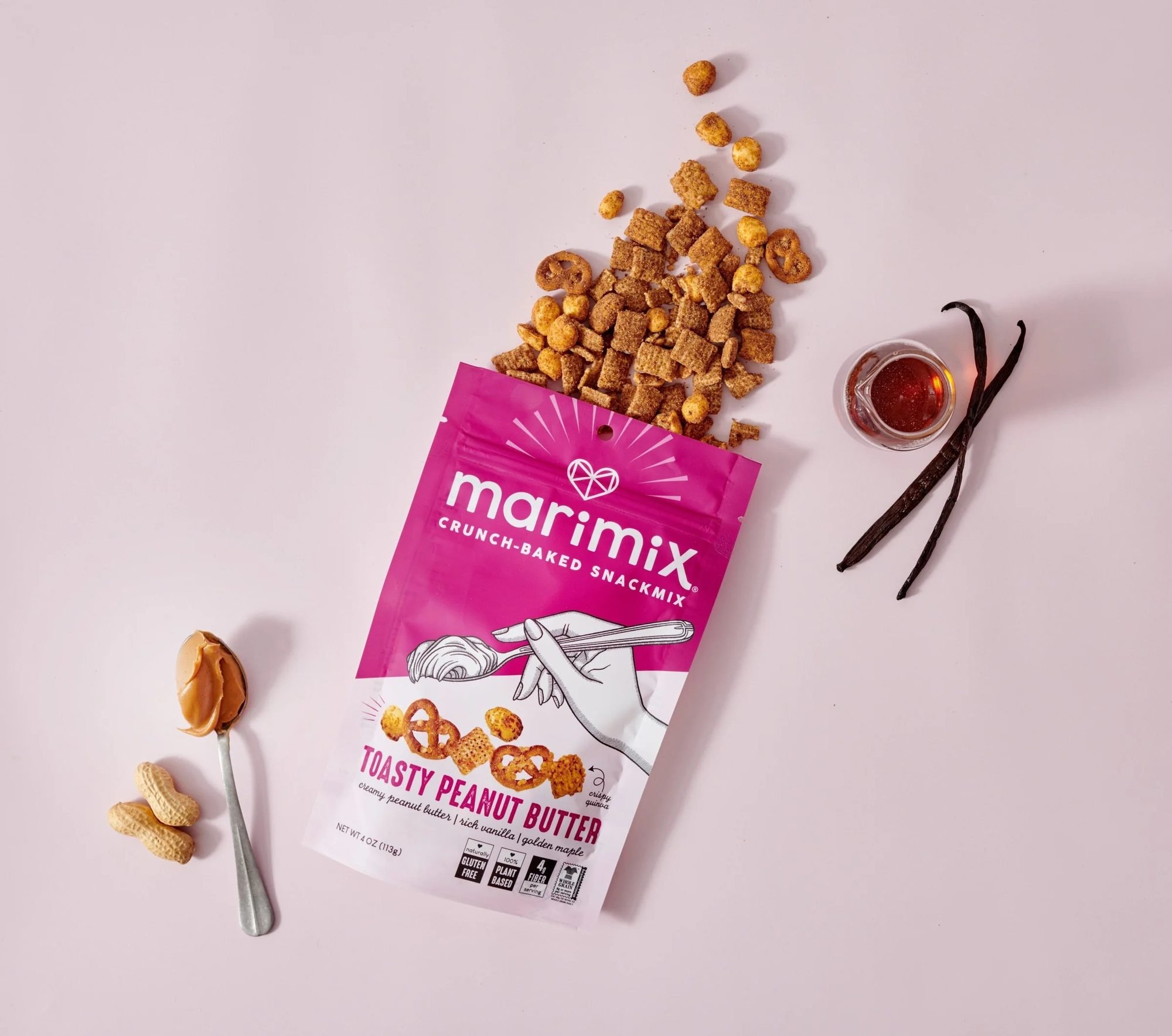 Marimix salty peanut butter snack bag spilling snacks with vanilla, CPG snack photography