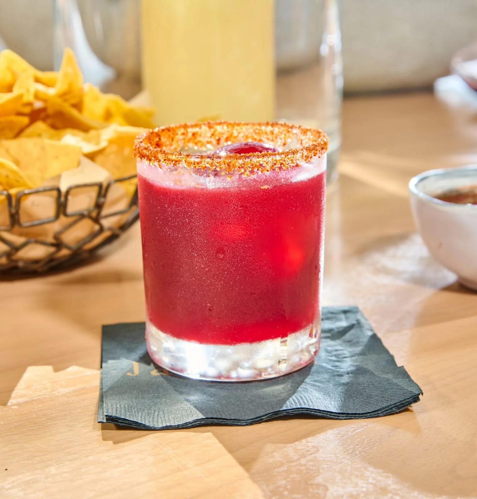 Drink styling: red agua fresca with chili salt rim