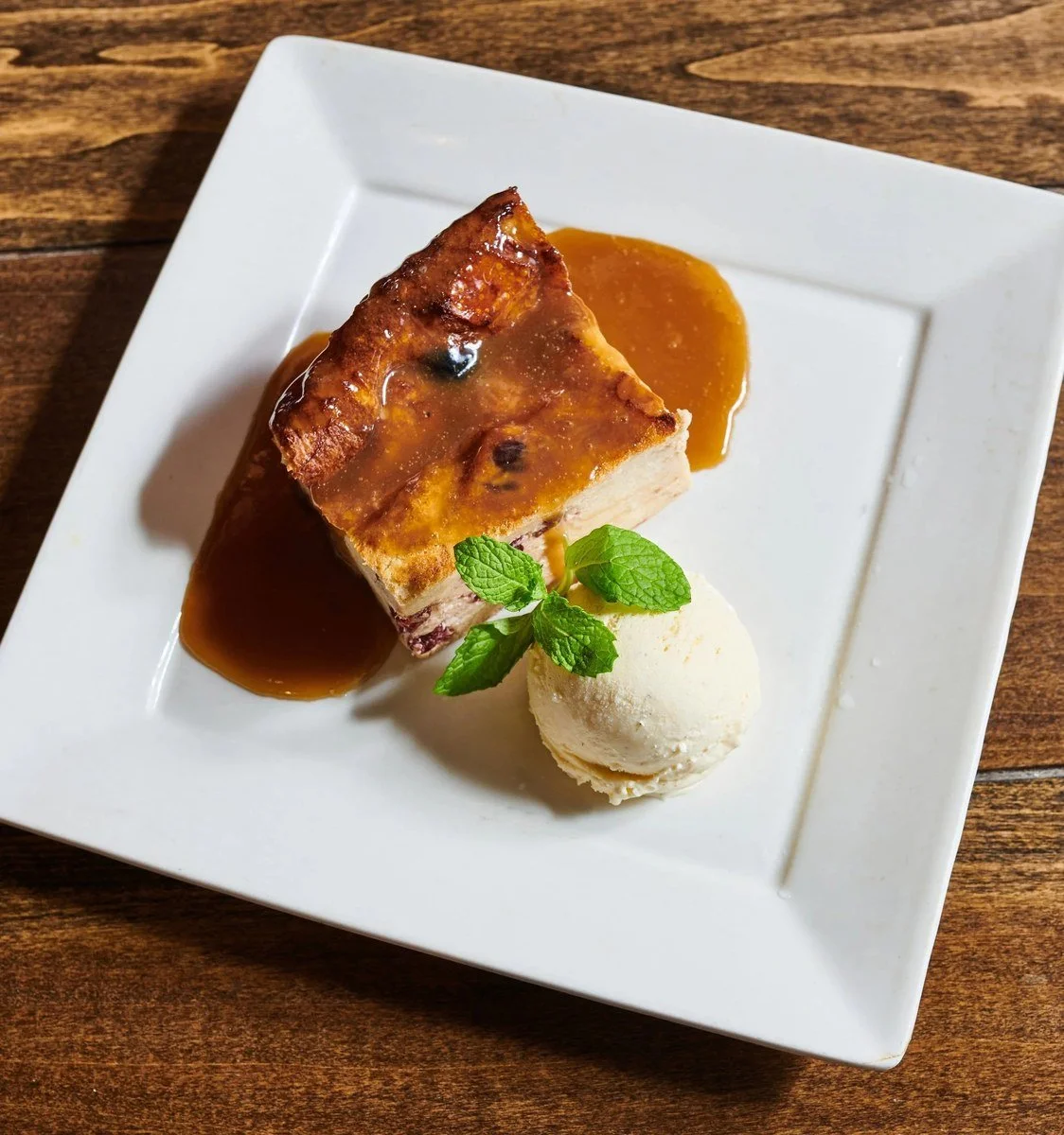 Bread pudding with ice cream and caramel sauce
