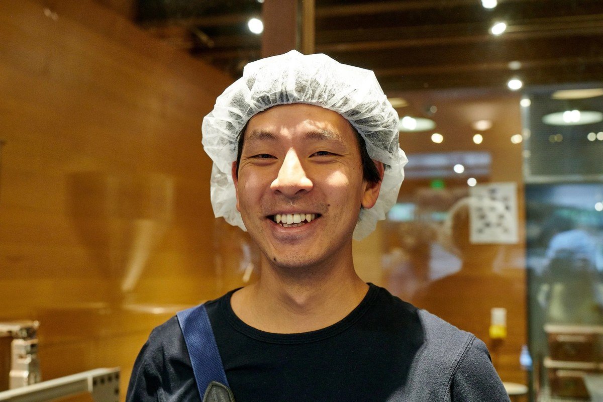 Smiling cook in a hairnet