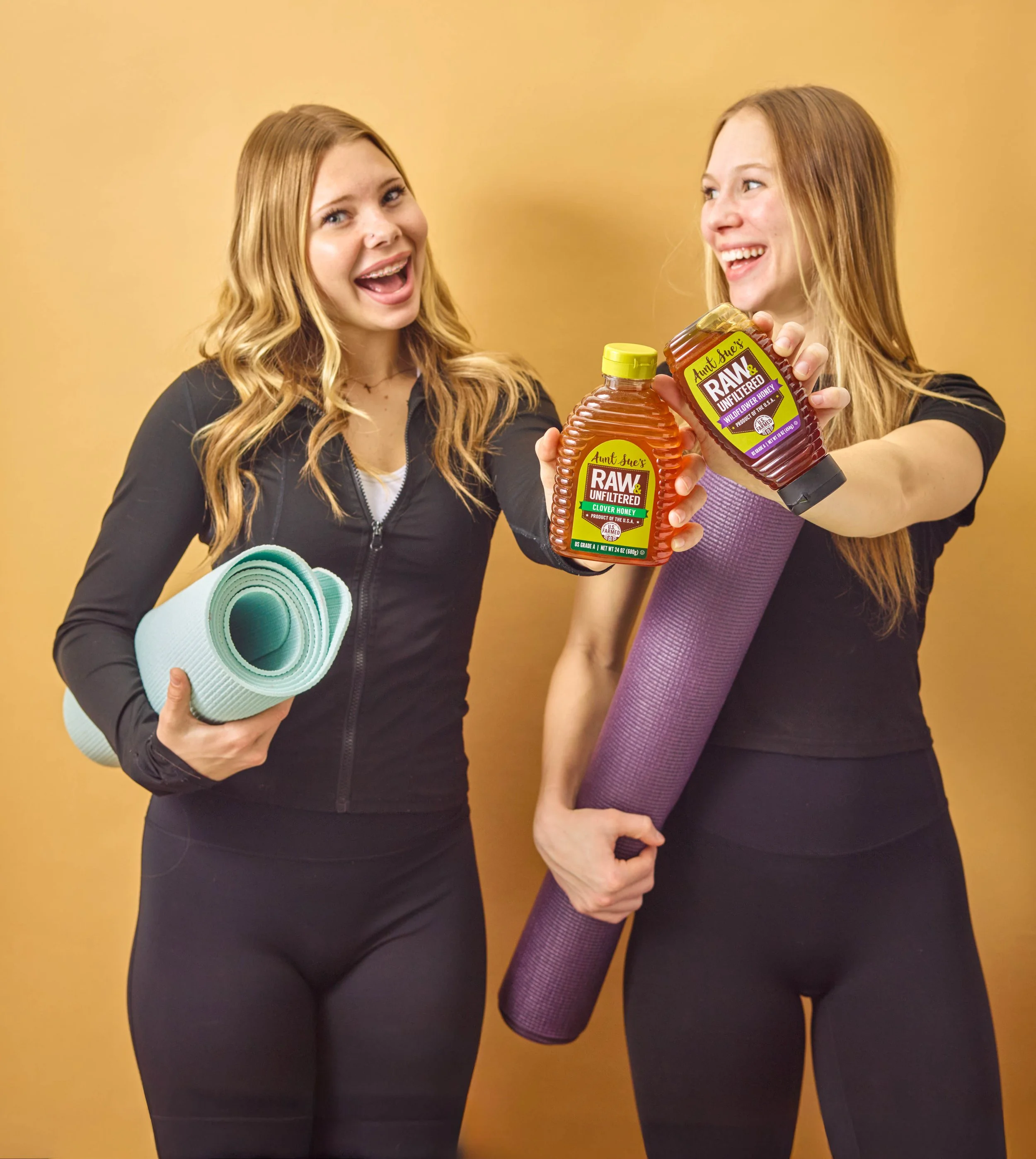 Two sisters models for fitness and yoga with honey
