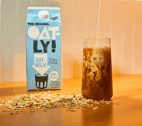 Oatly oat milk poured into an iced chai stop motion GIF, CPG beverage video