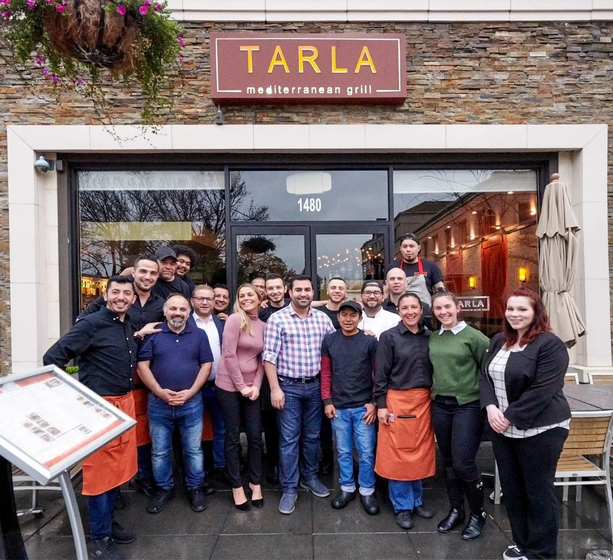 Restaurant team group portrait in front of Tarla Mediterranean Grill
