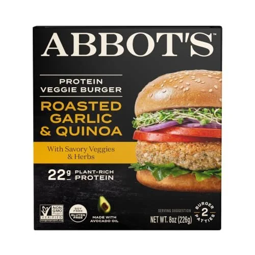 Abbot's protein veggie burger packaging with an image of a roasted garlic and quinoa burger in a bun with lettuce, tomato, and herbs.