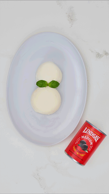snowman caprese salad gif with olives in can