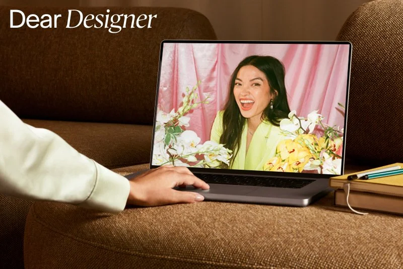 A laptop with Puno's headshot and "Dear Designer" in the top left corner