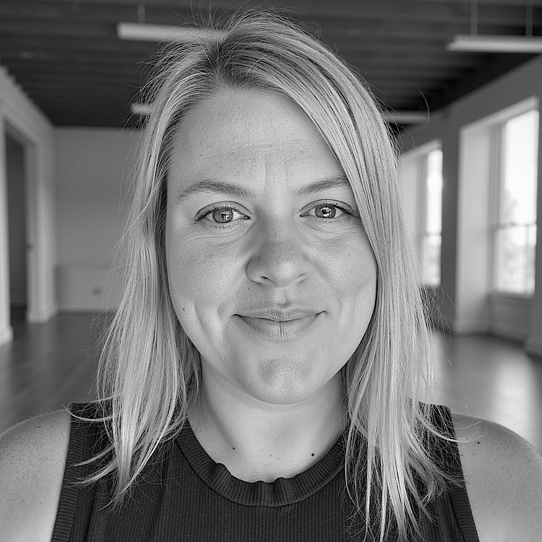 A photo of Squarespace web designer Kristine Neil smiling