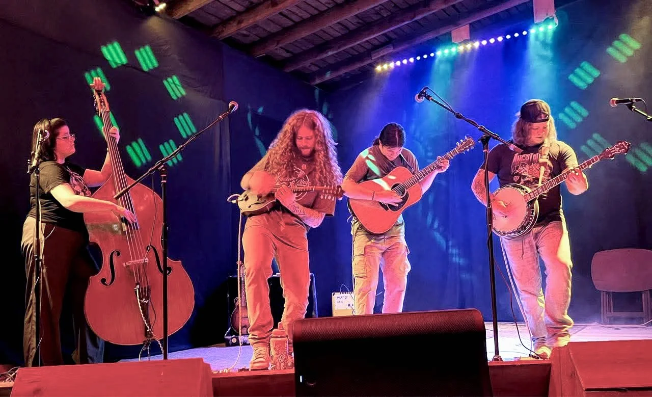 65 north pickers performing on stage