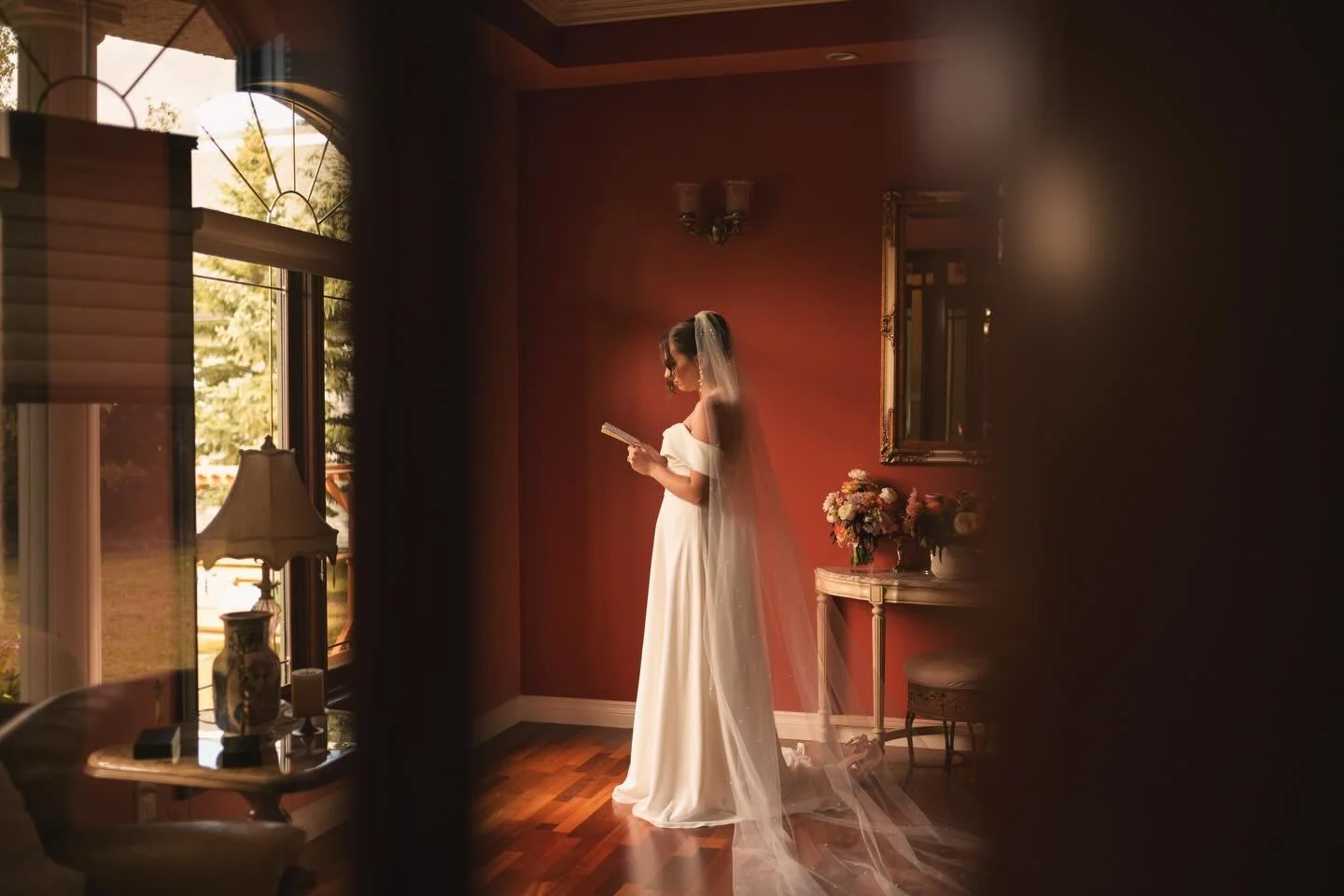 The calm before the I do&rsquo;s &mdash; that sacred pause where a bride stands in stillness, feeling every emotion rush in at once. The quiet excitement. The trembling joy as she reads over the sweet vows that her love will soon hear. The deep breat