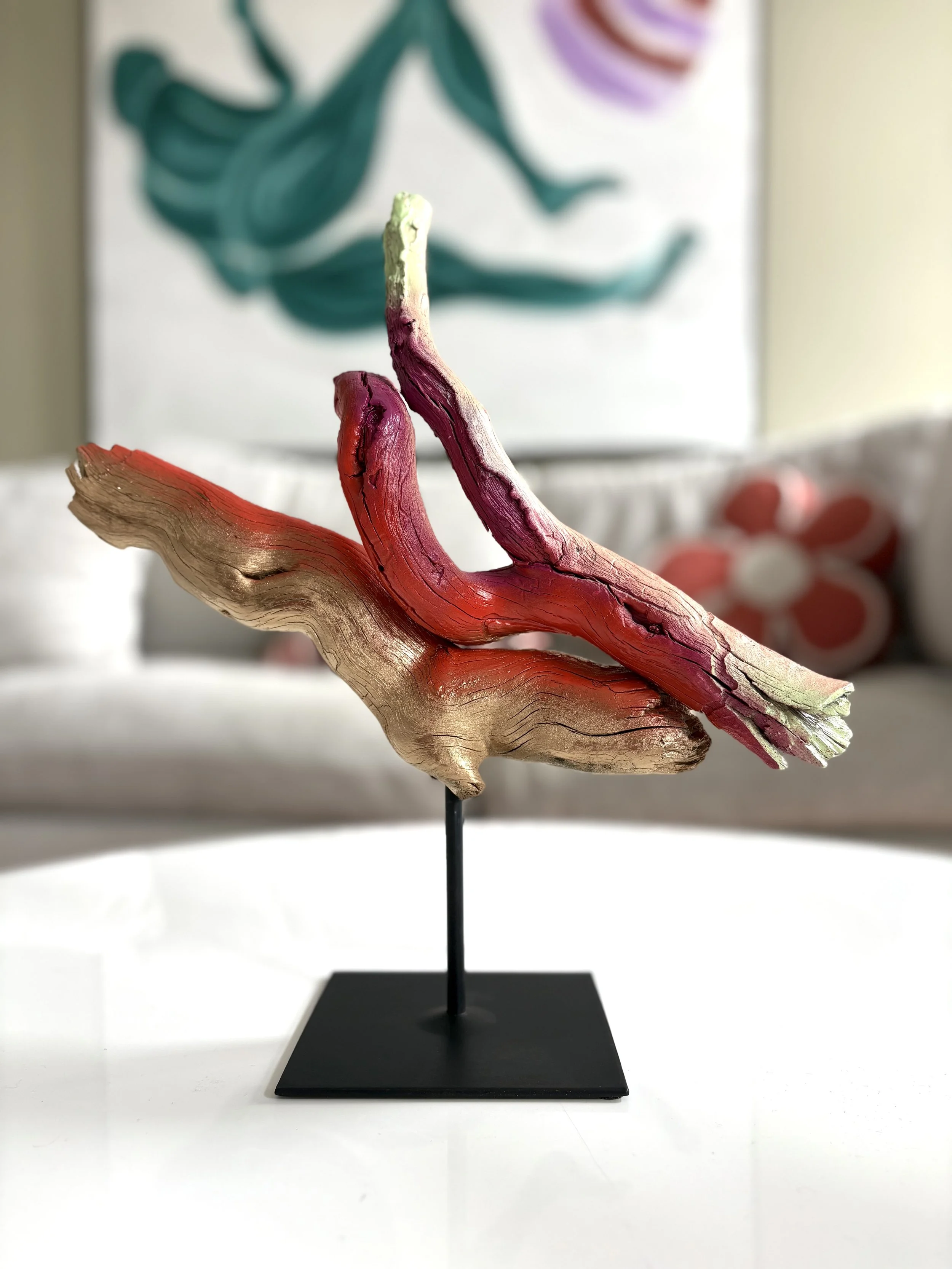 Rooted in Motion — contemporary abstract wood sculpture by Colorado artist Jessie Belisle, crafted from found weathered wood exploring balance, resilience, and transformation.”