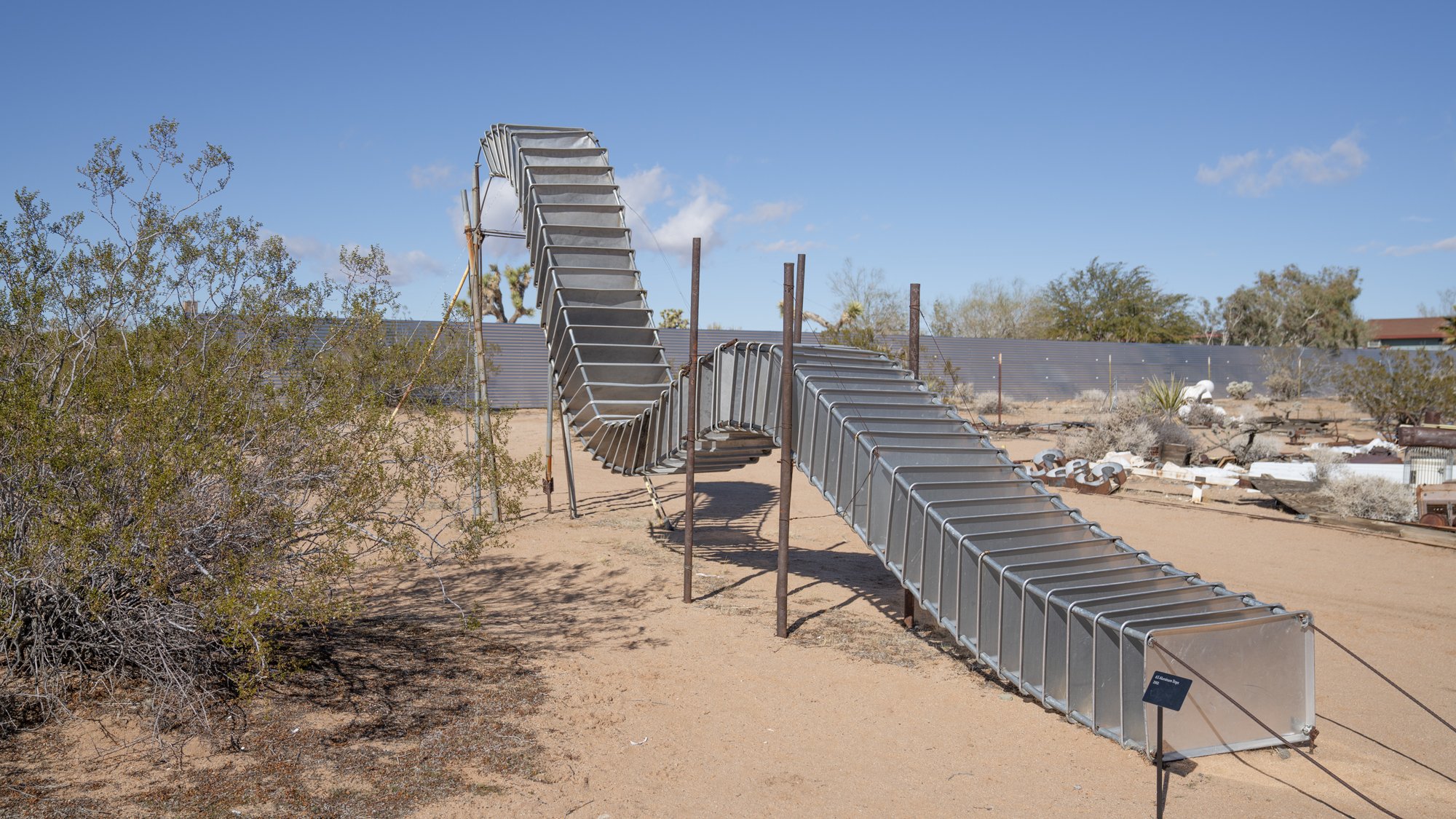 Noah Purifoy. 65 Aluminum Trays, 2002.