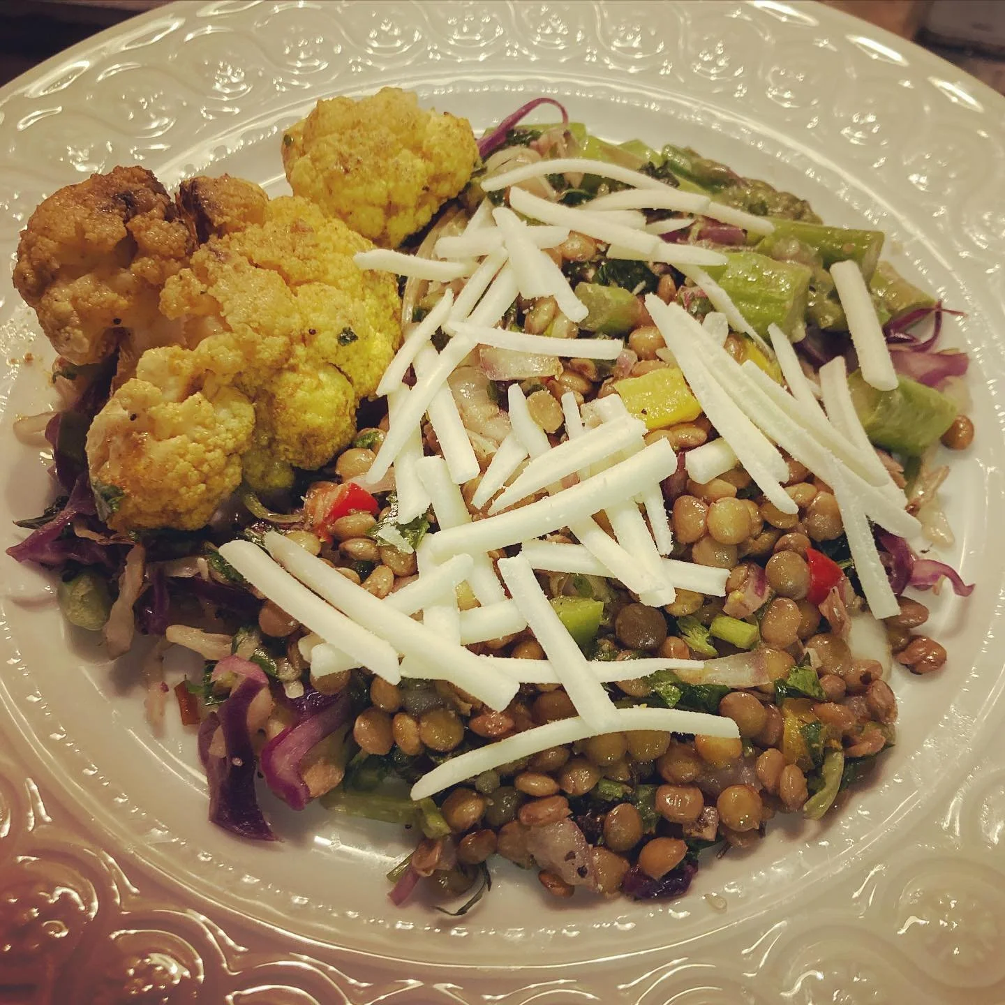 Nice little plant based din on this cozy Saturday night. Roasted curry cauliflower, roasted asparagus salad and lentils topped with @violife_foods mozzarella (legit tastes like the real deal!!) #plantbasedmeals #plantbasedprotein #glutenfree #dairyfr