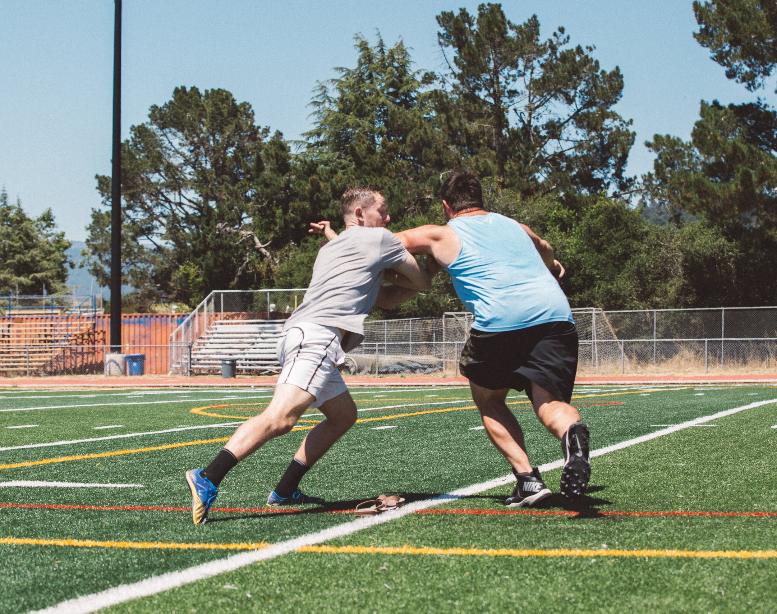 Andy Stiff arms austin.jpg