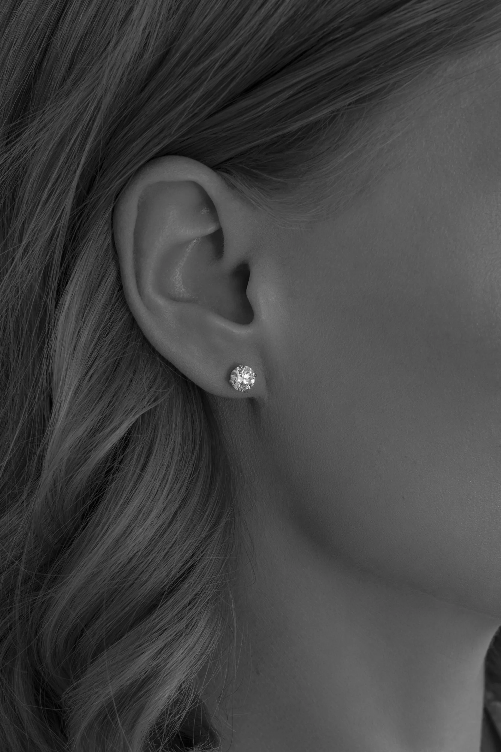 Photograph of  model Devojka wearing Unique Diamonds earrings, ring and necklace by Canberra photographer Tina Nikolovski