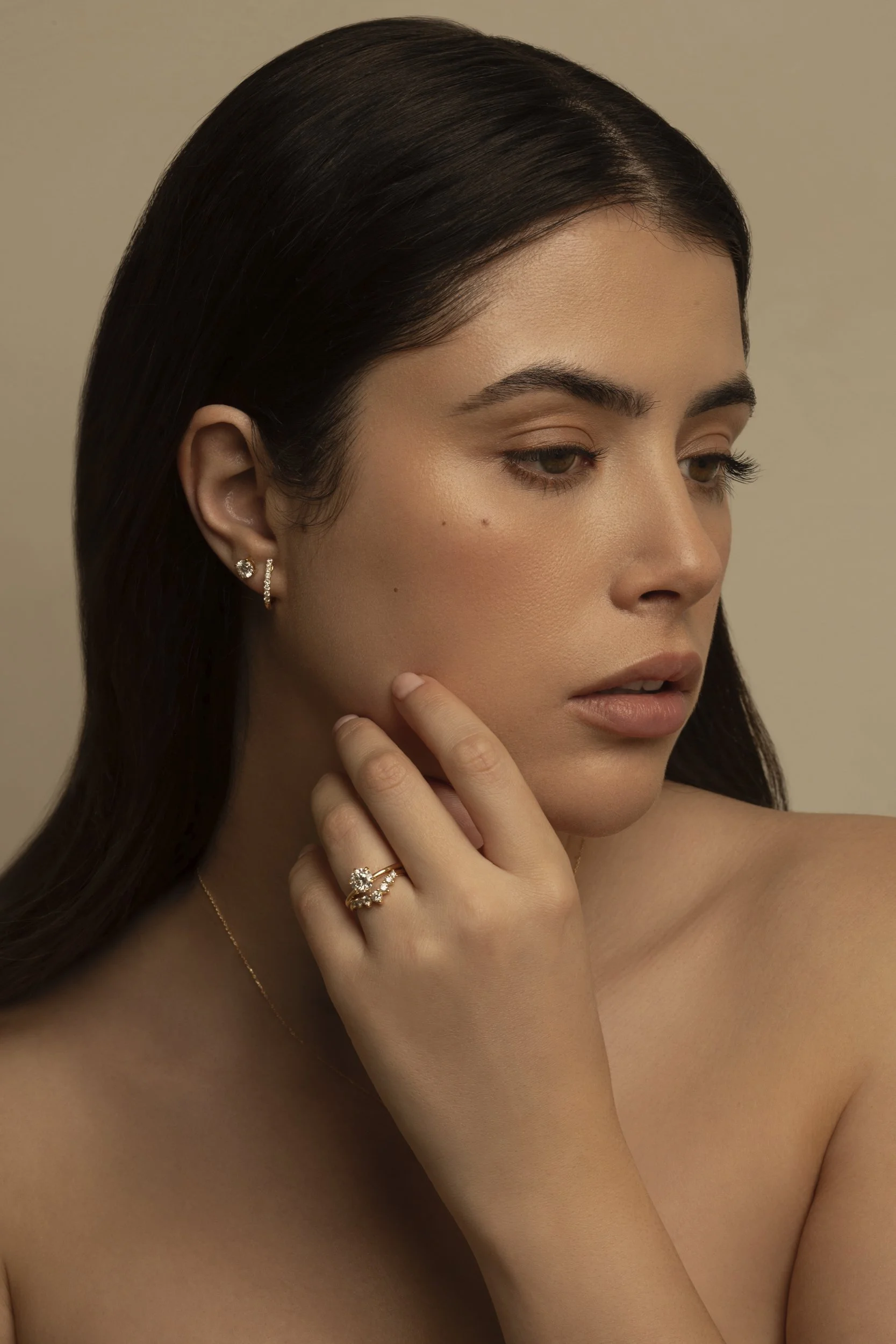 Photograph of  model Devojka wearing Unique Diamonds earrings, ring and necklace by Canberra photographer Tina Nikolovski