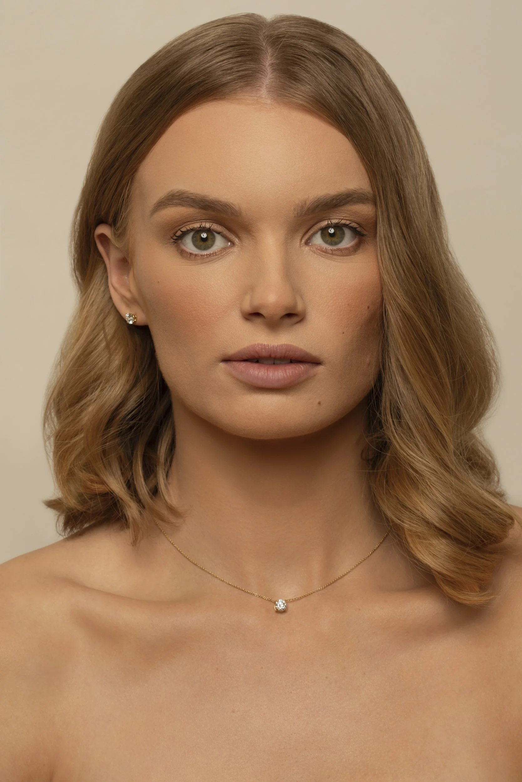 Photograph of  model Devojka wearing Unique Diamonds earrings, ring and necklace by Canberra photographer Tina Nikolovski