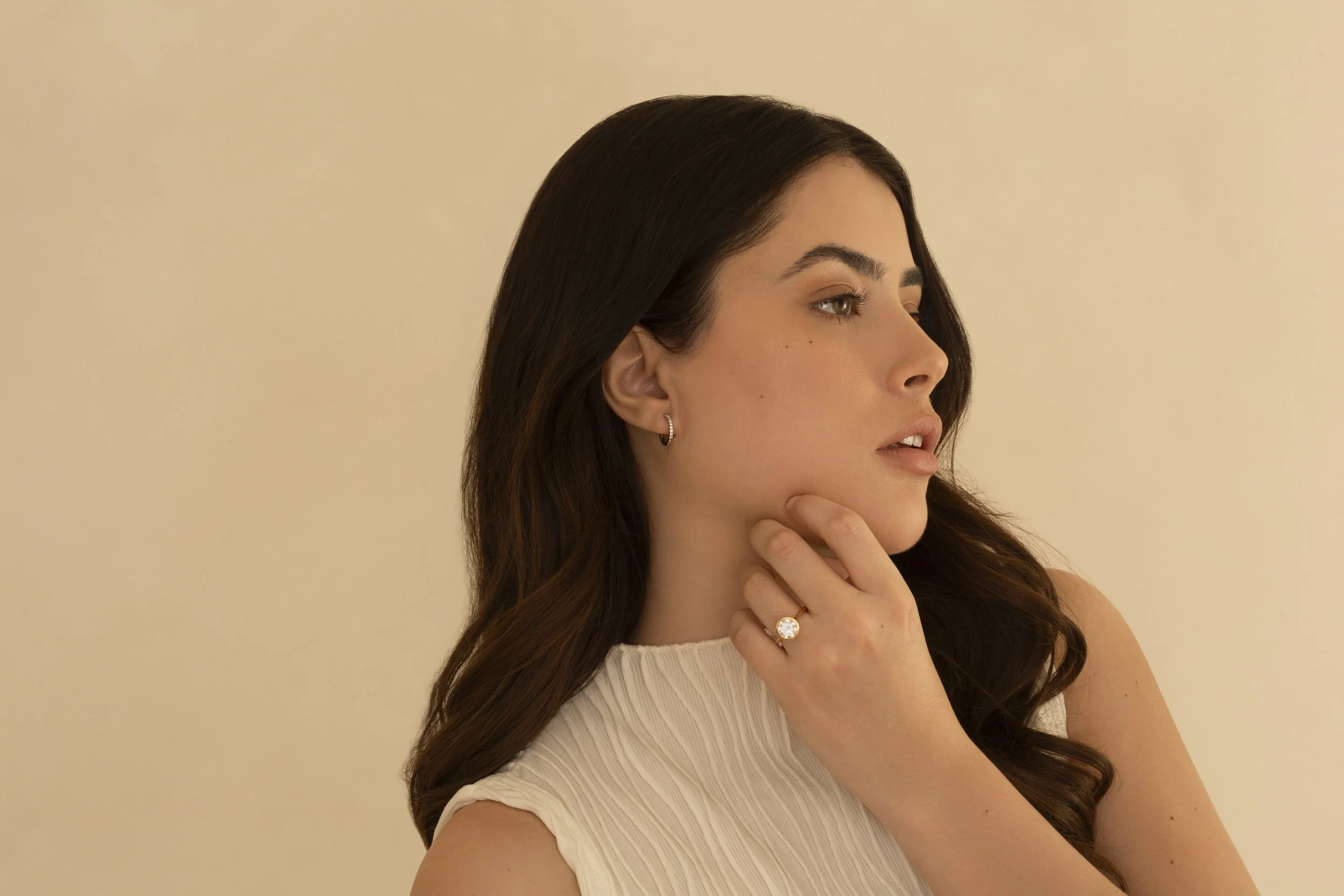 Photograph of  model Devojka wearing Unique Diamonds earrings, ring and necklace by Canberra photographer Tina Nikolovski