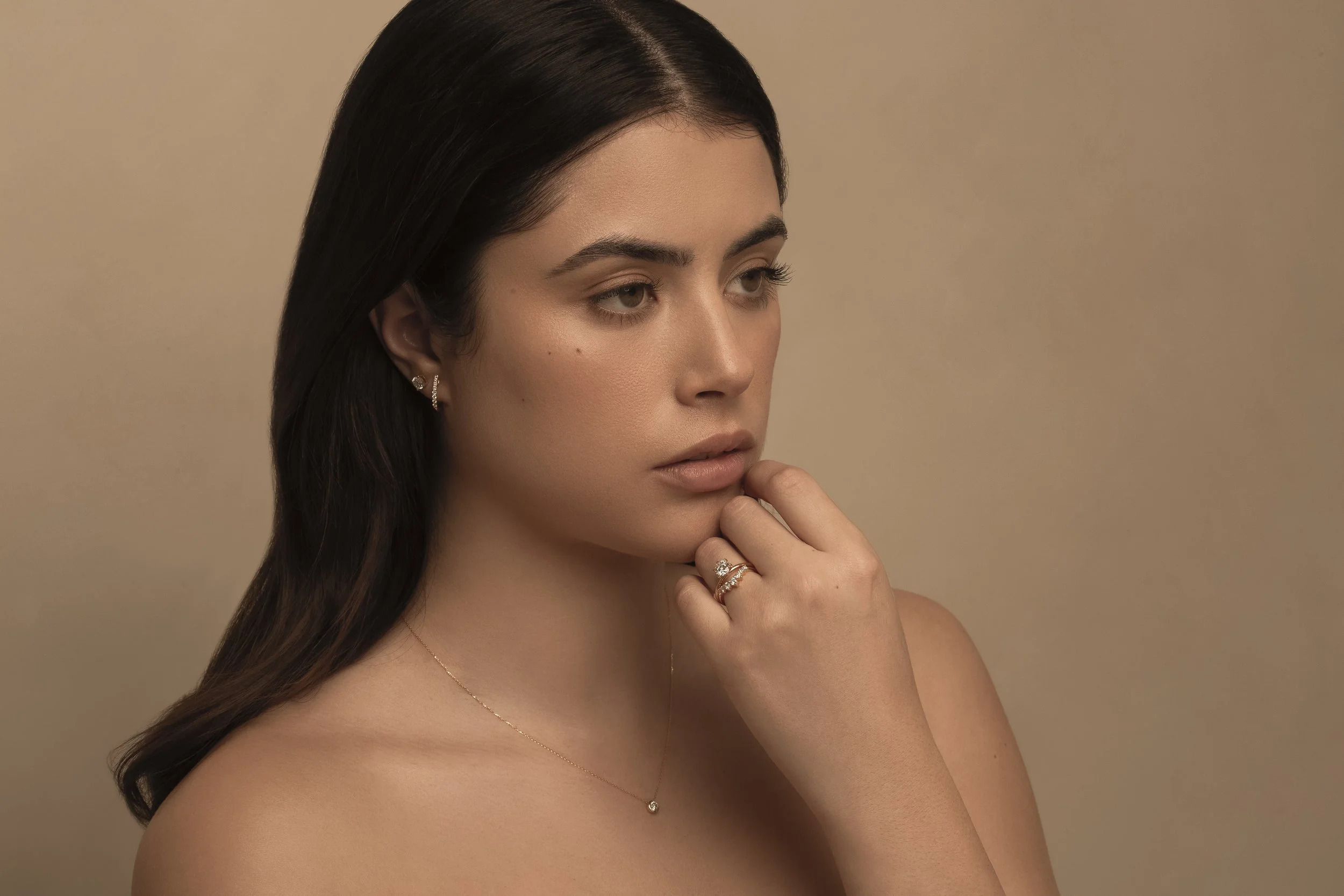 Photograph of  model Devojka wearing Unique Diamonds earrings, ring and necklace by Canberra photographer Tina Nikolovski