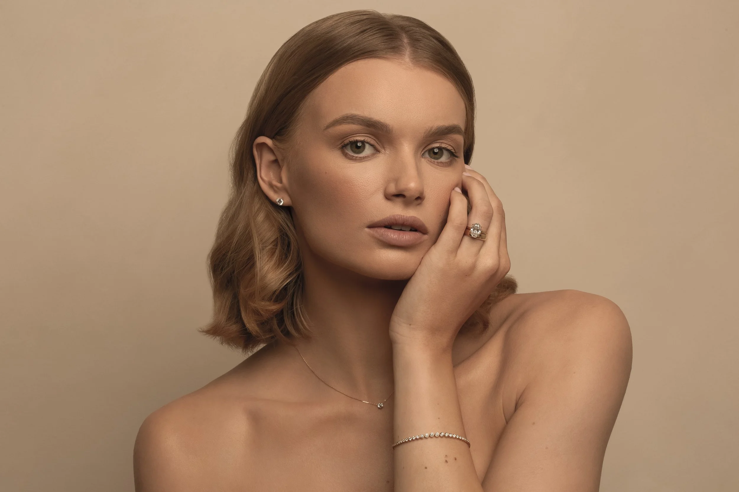 Photograph of  model Devojka wearing Unique Diamonds earrings, ring and necklace by Canberra photographer Tina Nikolovski