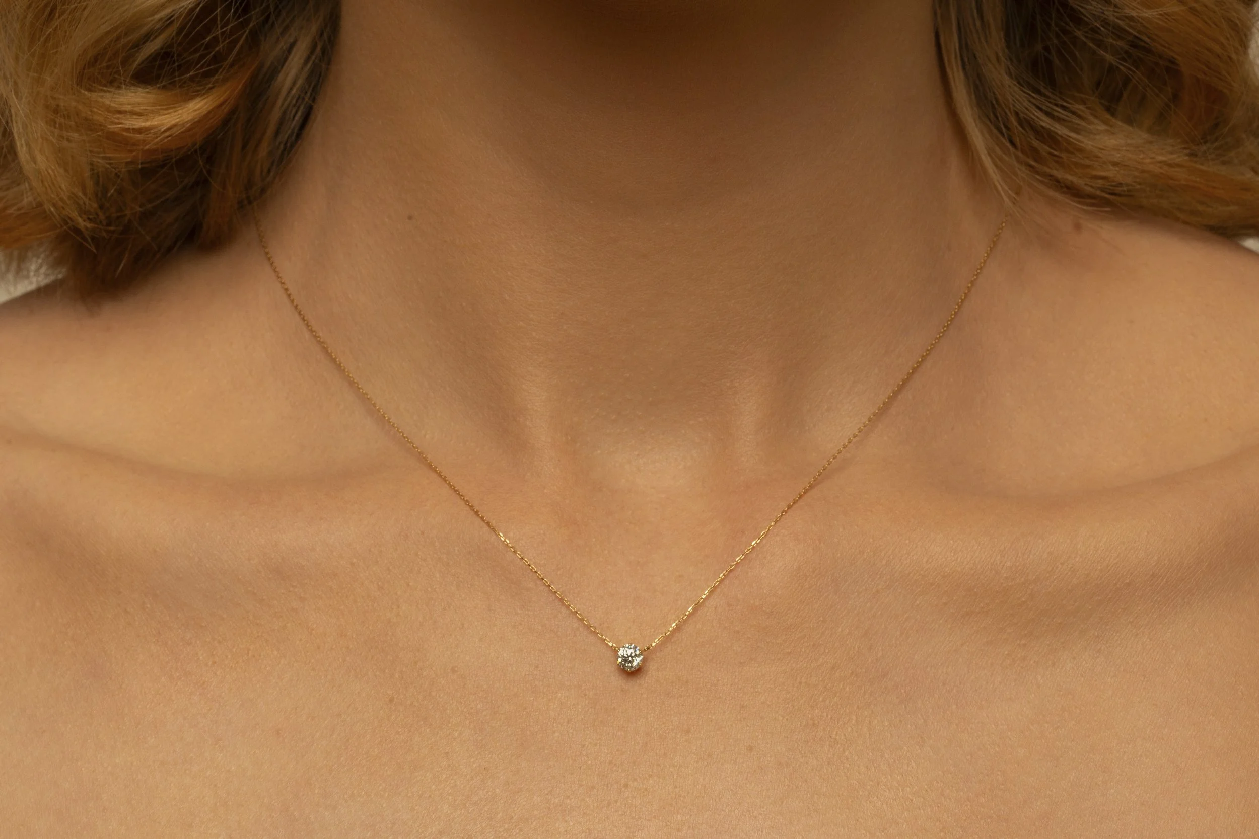 Photograph of  model Devojka wearing Unique Diamonds earrings, ring and necklace by Canberra photographer Tina Nikolovski