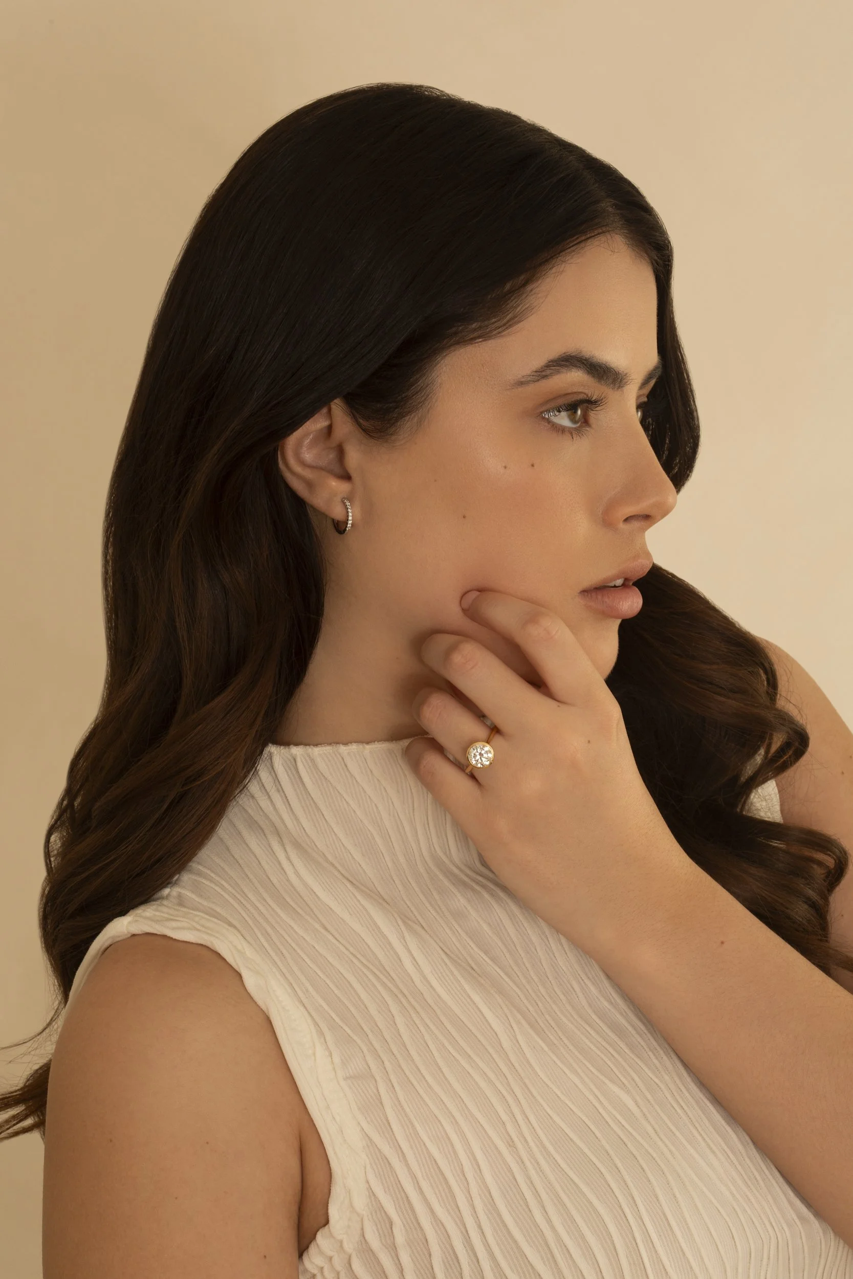 Photograph of  model Devojka wearing Unique Diamonds earrings, ring and necklace by Canberra photographer Tina Nikolovski