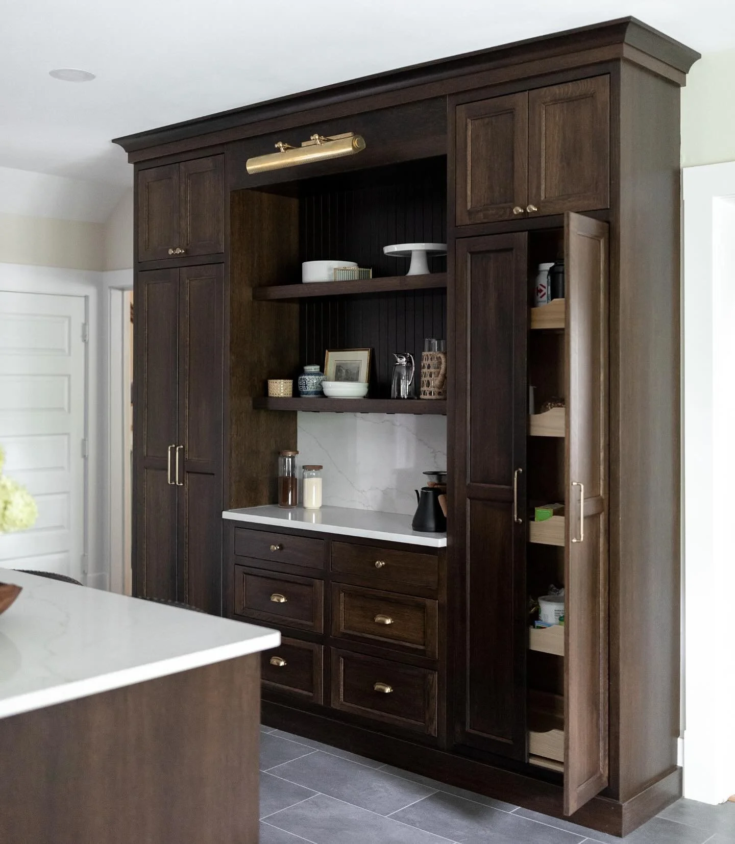 Throwback to this beauty. A true workhorse of the kitchen&mdash;this floor-to-ceiling cabinetry is as hardworking as it is beautiful. Designed to house a seamless pantry, coffee station, and a dedicated spot for daily essentials, it brings effortless