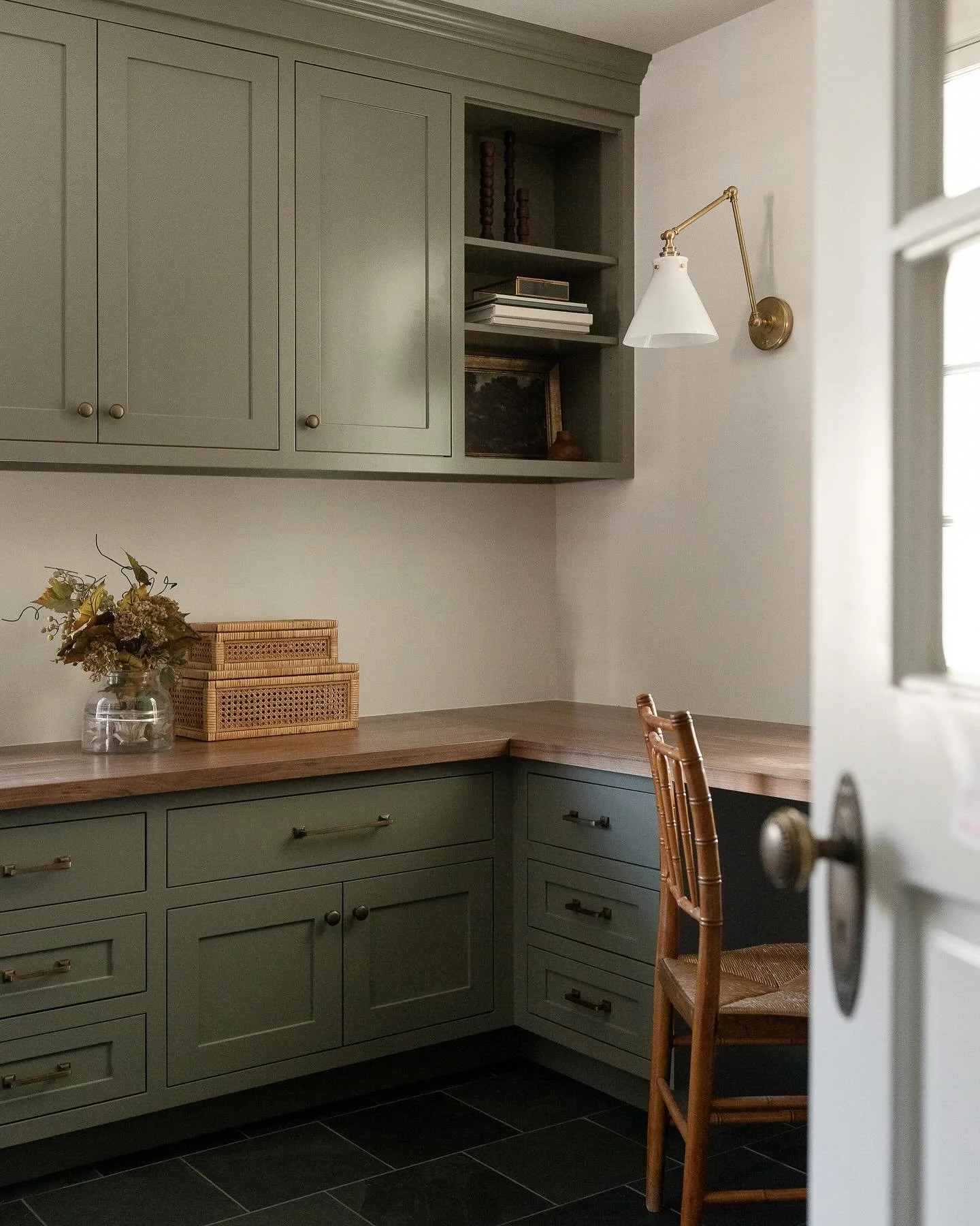 A Creative Space Rooted in History

Designing this multi-function laundry &amp; craft room in a historic home meant blending functionality and creativity while honoring the rich legacy of its past. This home was originally designed by Columbia native