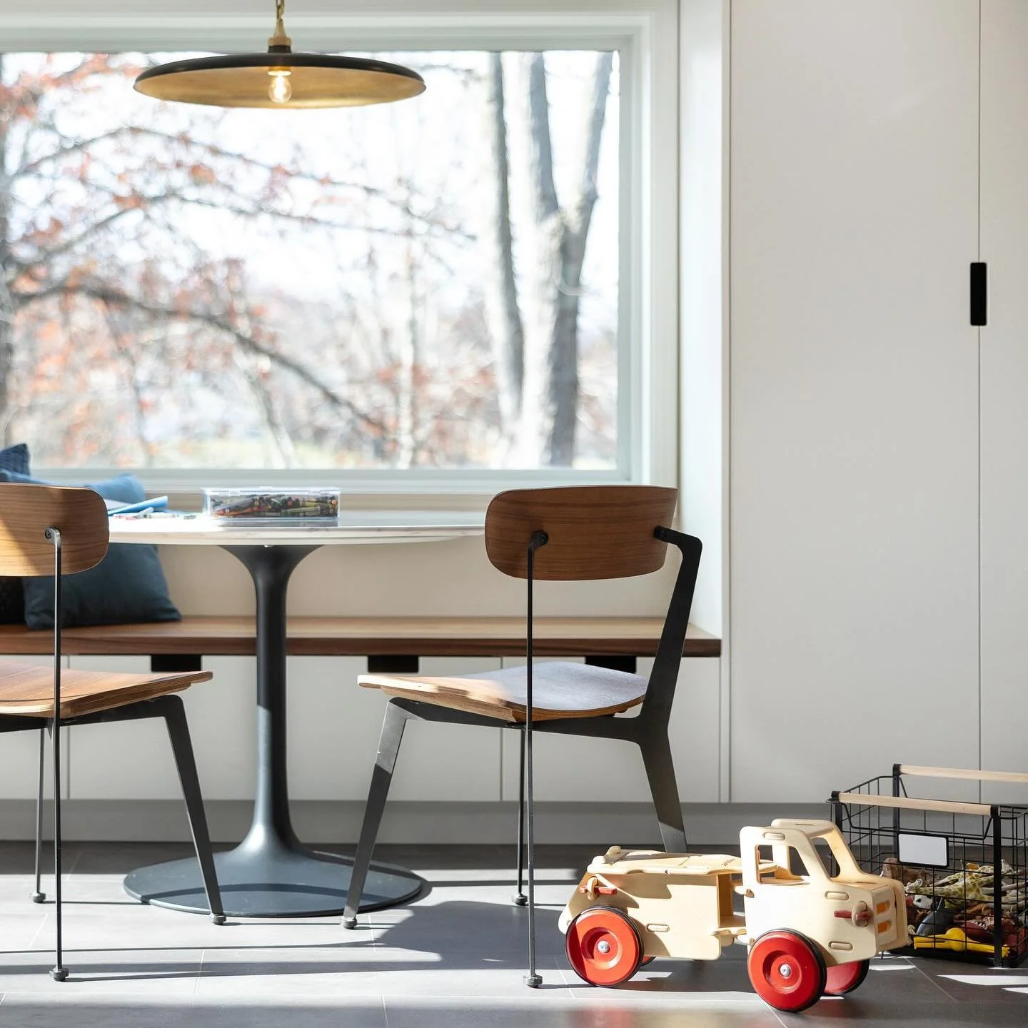 Transformed this basement into a sleek, bright, and organized haven with a laundry list of dedicated spaces. From a practical mudroom &amp; drop zone to a versatile playroom with extra seating that doubles as storage, a multi-functional media zone (c