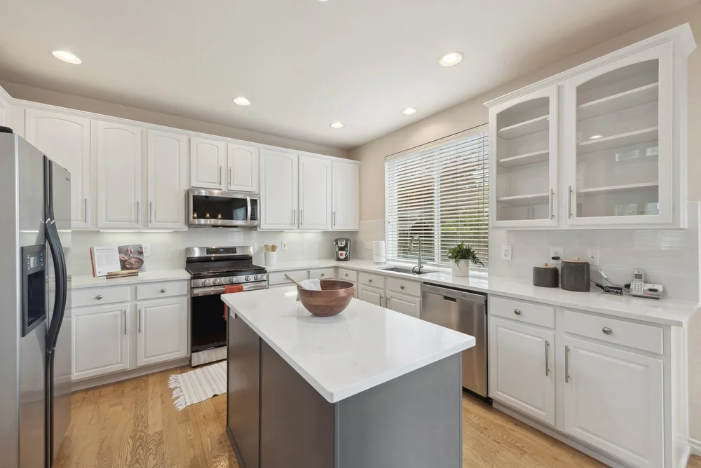 08_27729MapleRidgeWaySE_5_Kitchen_HiRes.jpg