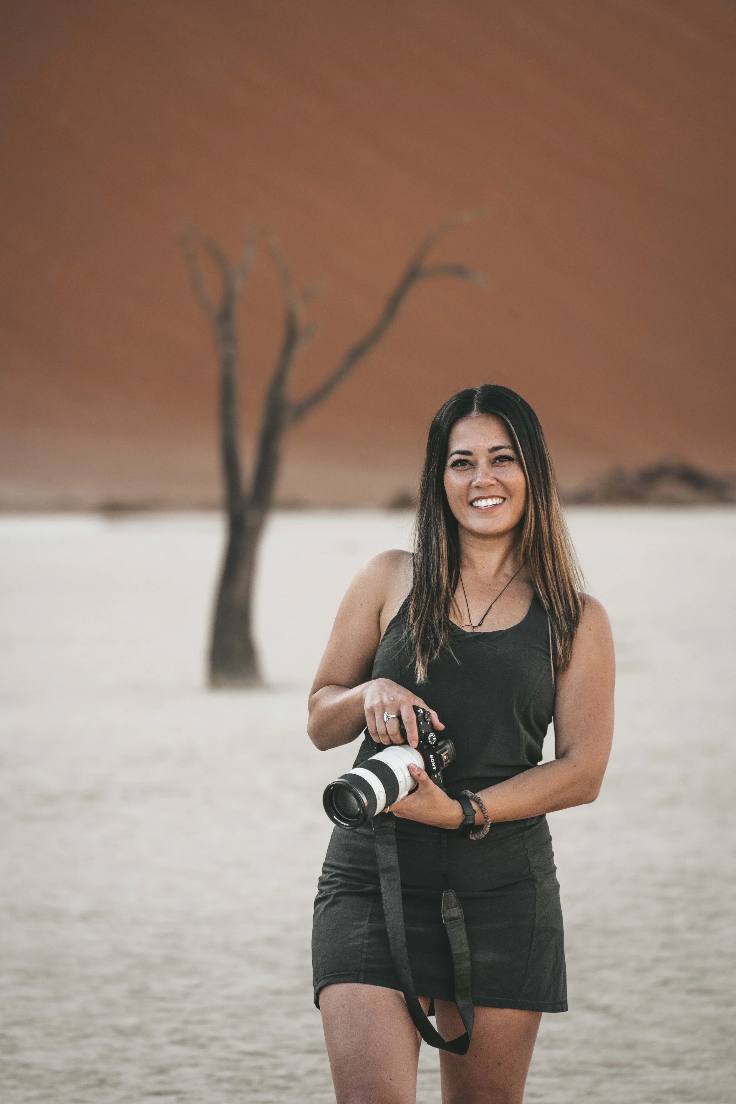 Professional photographer Anna shooting landscape photography in Namibia
