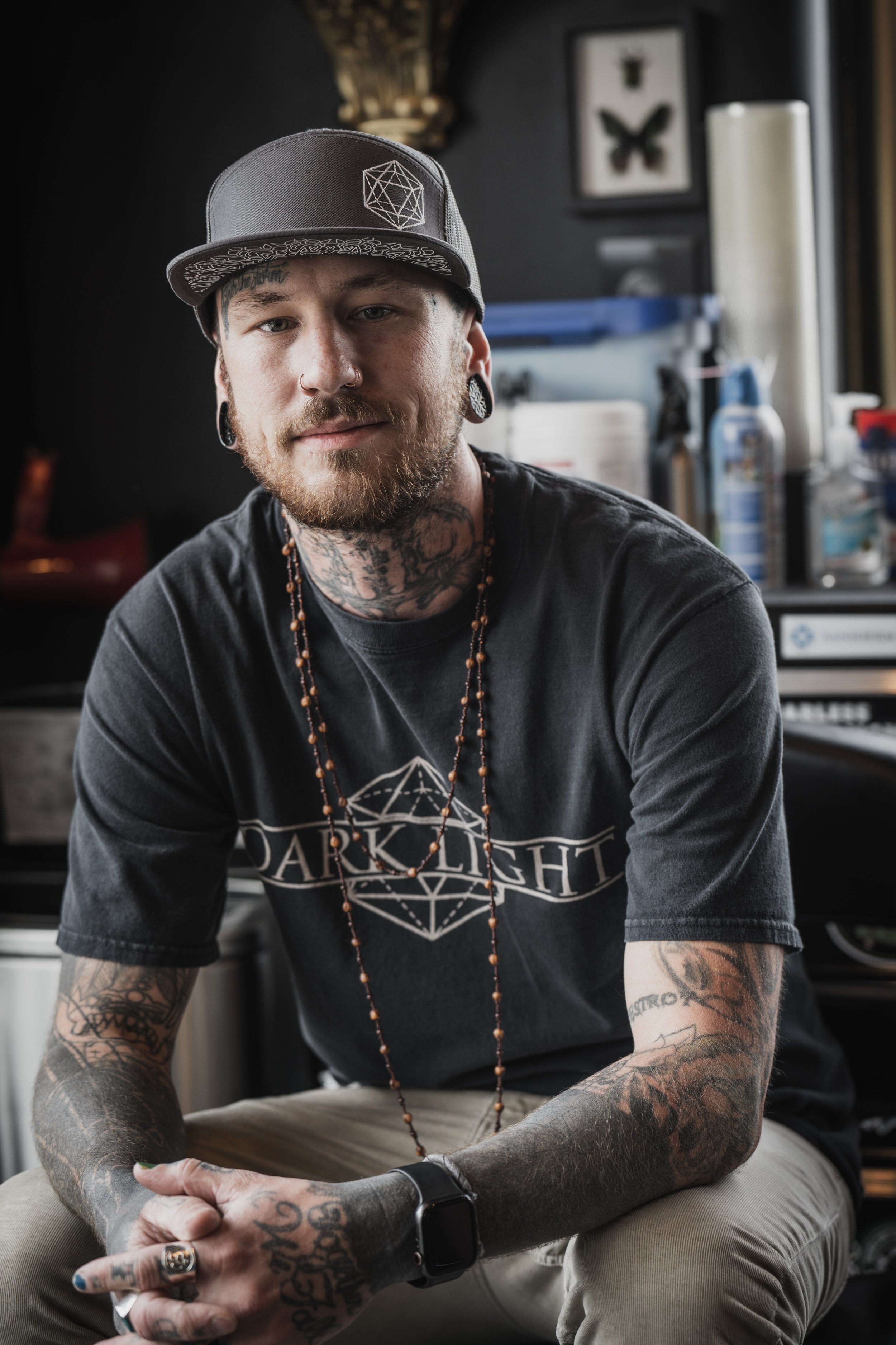 Zach Atlan poses for a portrait in his Fort Collins, Colo. tattoo shop on Apr. 23, 2022. To Atlan sees visual art as a major contributor to a person's life: "I want to relate, inspire, and open the minds of everyone I meet. I want to help people find