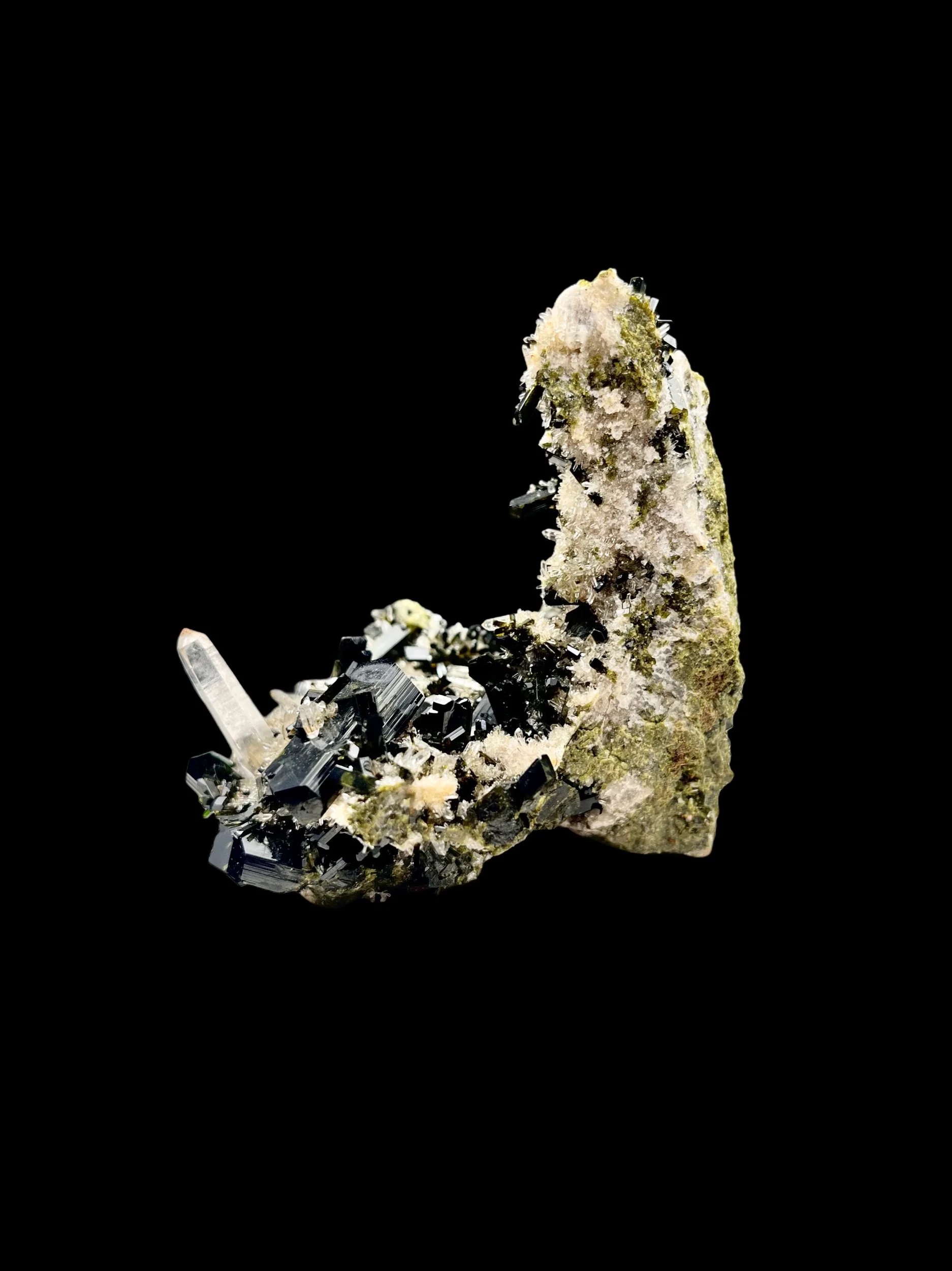 quartz crystal point with dark epidote crystals Peru mineral specimen