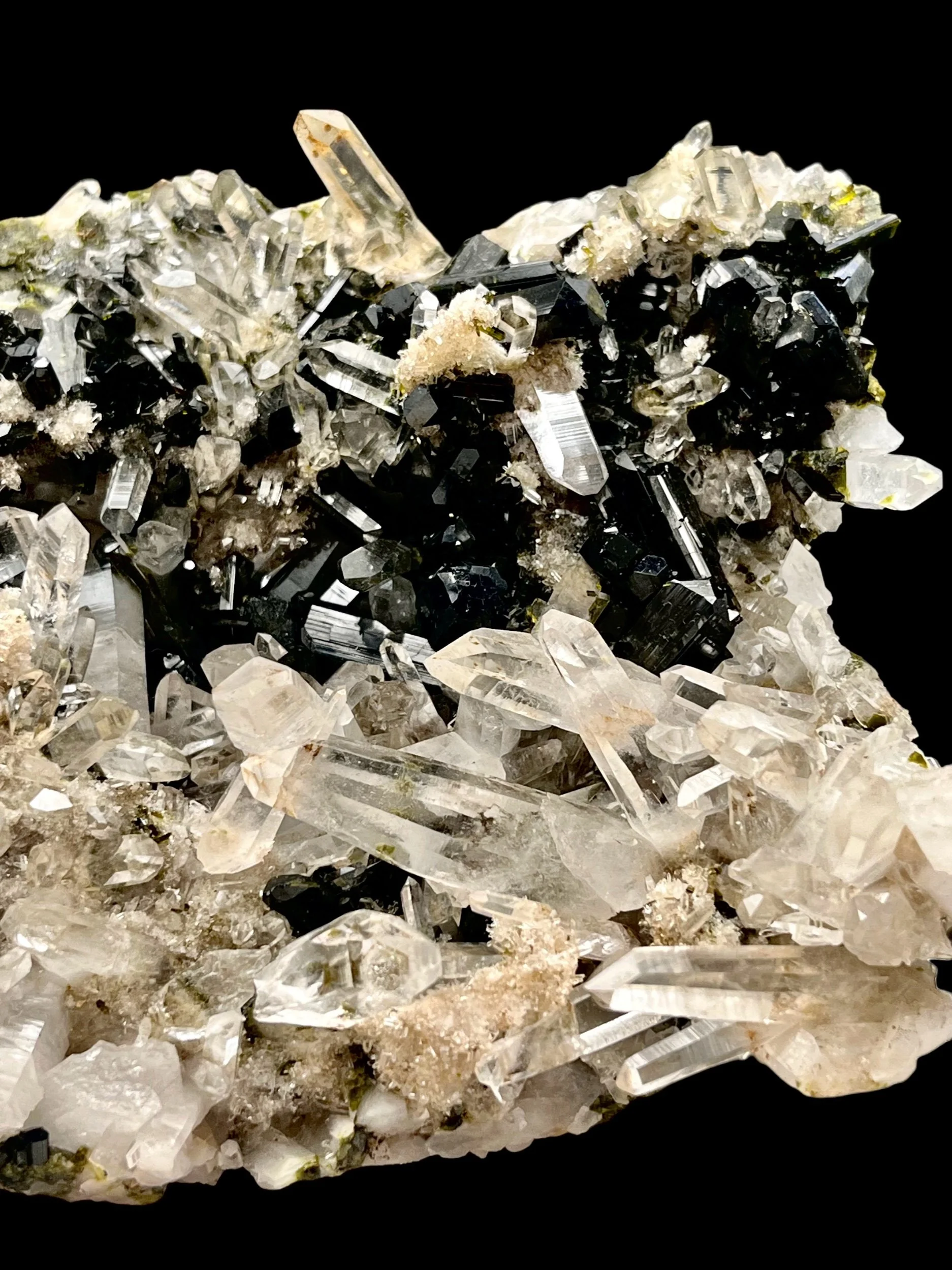 lustrous epidote crystals with clear quartz points Peru mineral specimen