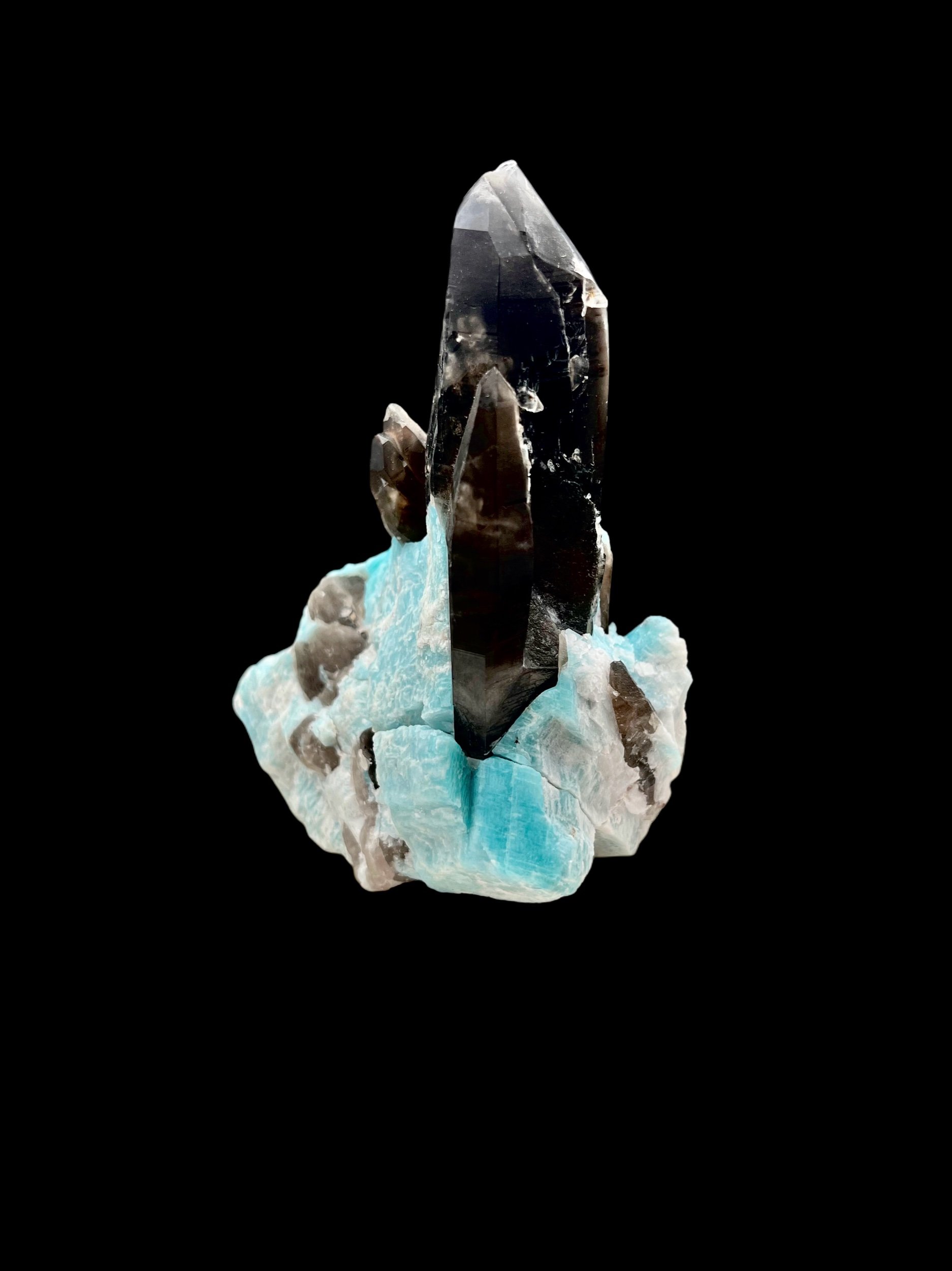 Smoky quartz points rising from amazonite feldspar matrix Pikes Peak Colorado