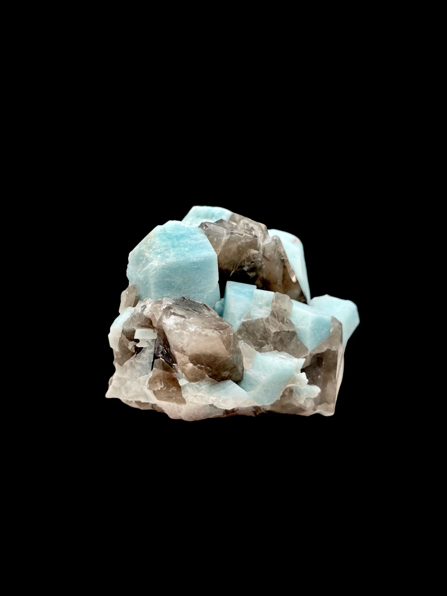 Smoky quartz crystals embedded in amazonite feldspar matrix Pikes Peak