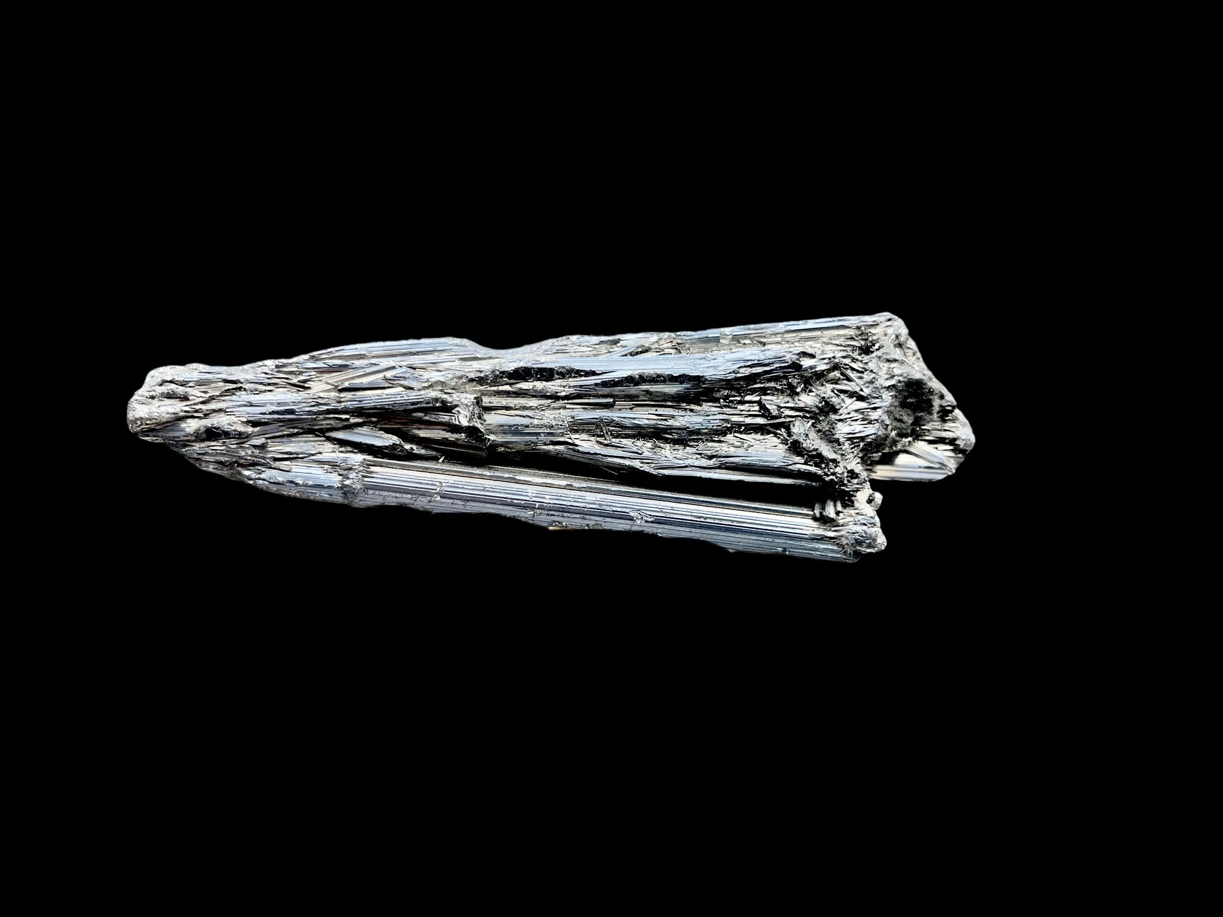 Stibnite metallic crystal cluster long tapered formation high luster specimen