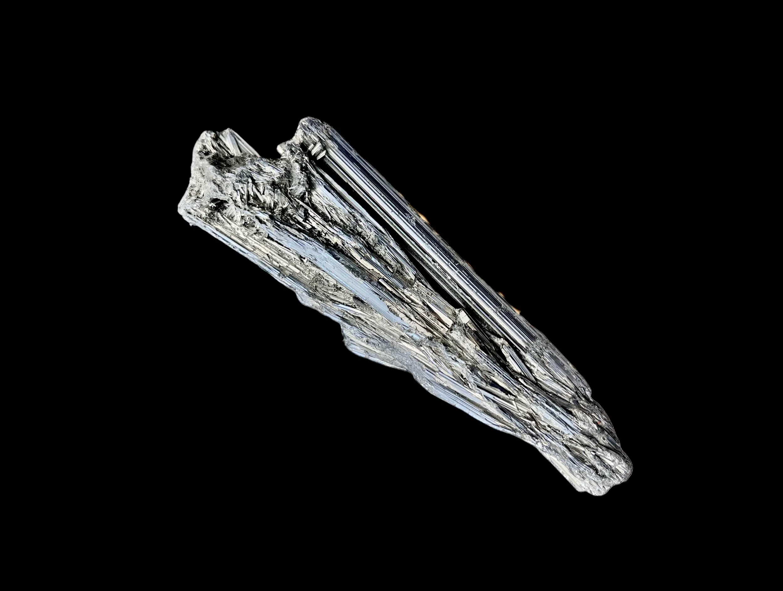 Stibnite long bladed crystal formation bright metallic luster collector specimen