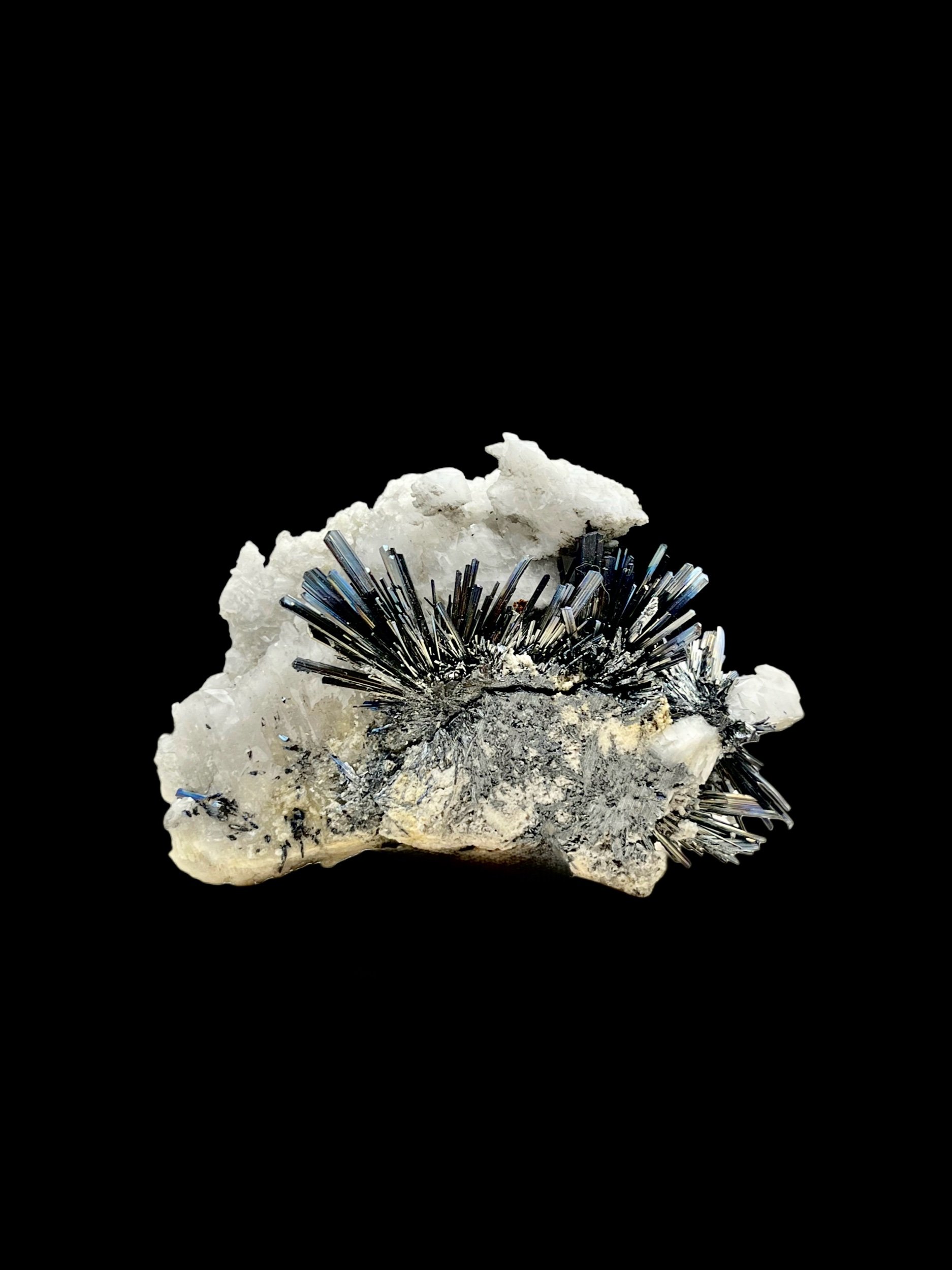 Stibnite spray on fluorescent calcite China metallic silver needle crystal specimen